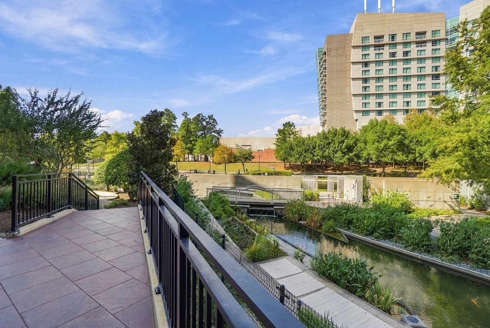 Scenic waterfront pathways wind through beautifully maintained landscaping, perfect for enjoying the outdoors.