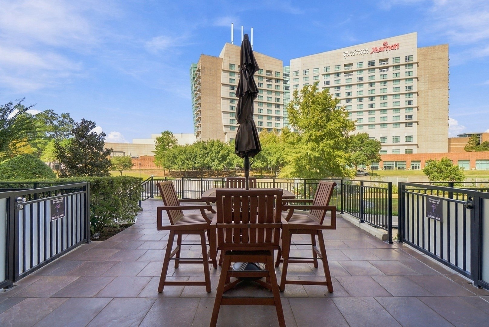 Enjoy outdoor dining and gathering spaces surrounded by the beauty of The Woodlands Waterway.