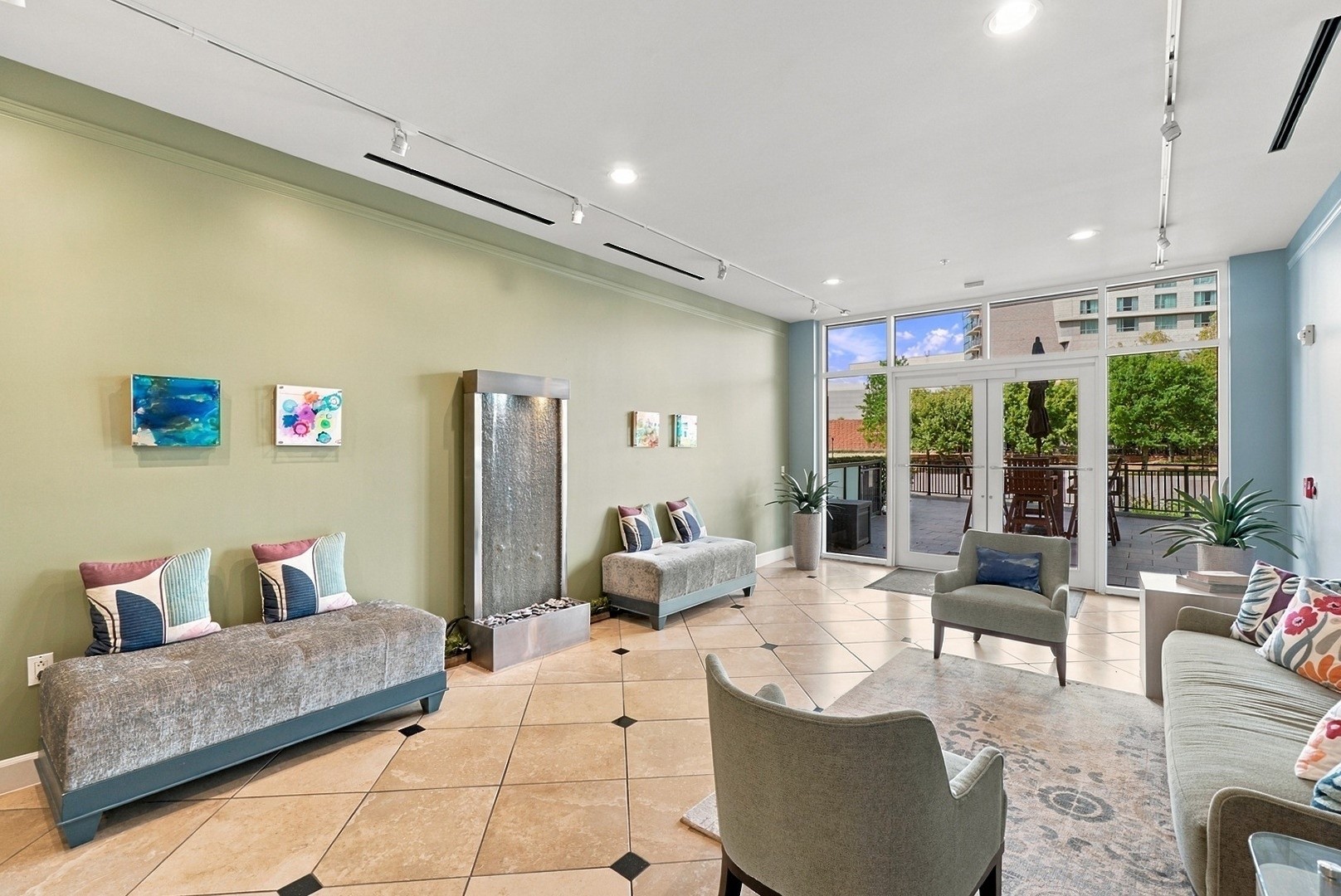 An inviting gathering space with modern furnishings, natural light, and a sophisticated atmosphere.