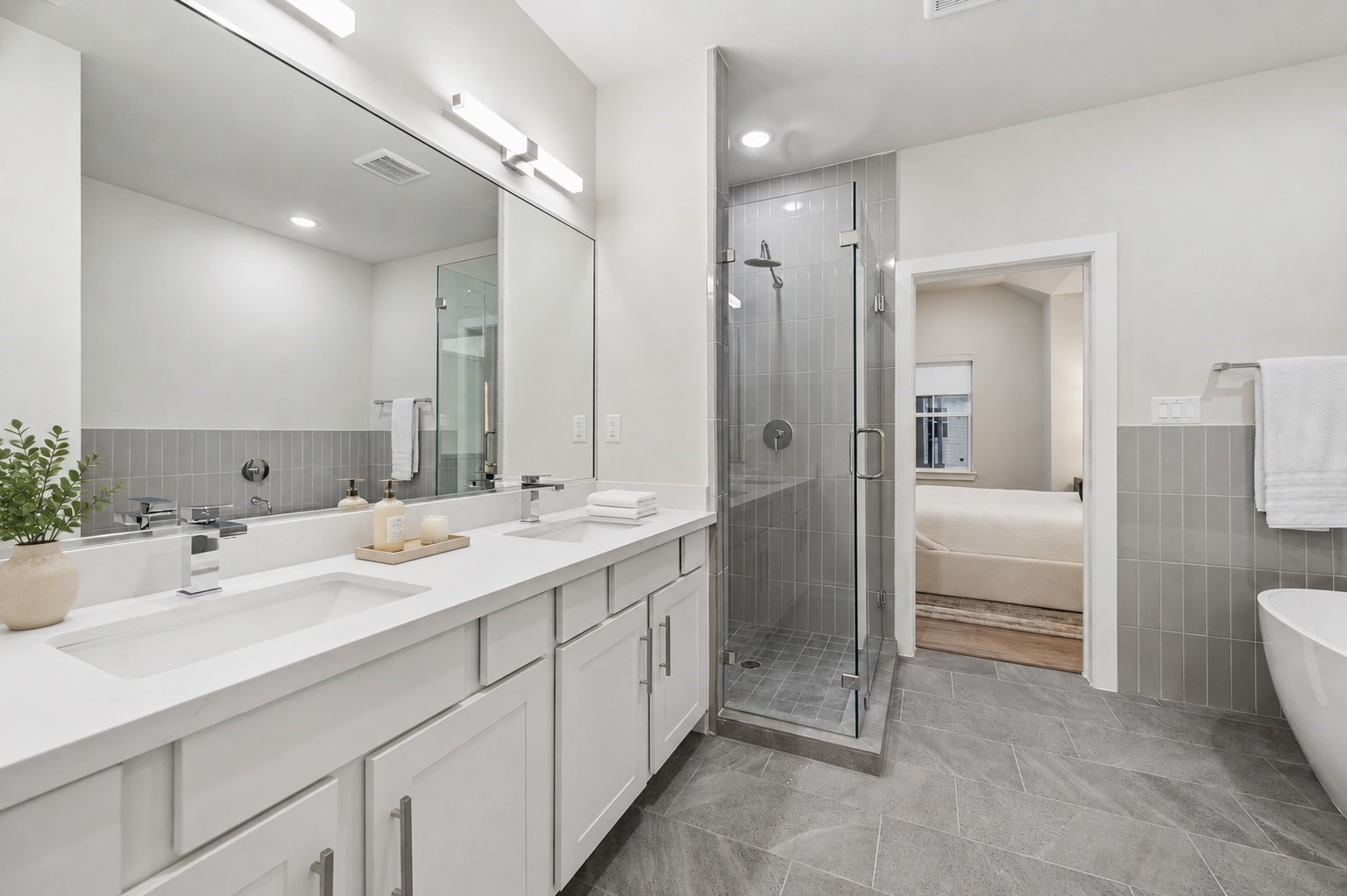 Representative photo showing the communitys model home primary bathroom. Layout and selections may vary.
