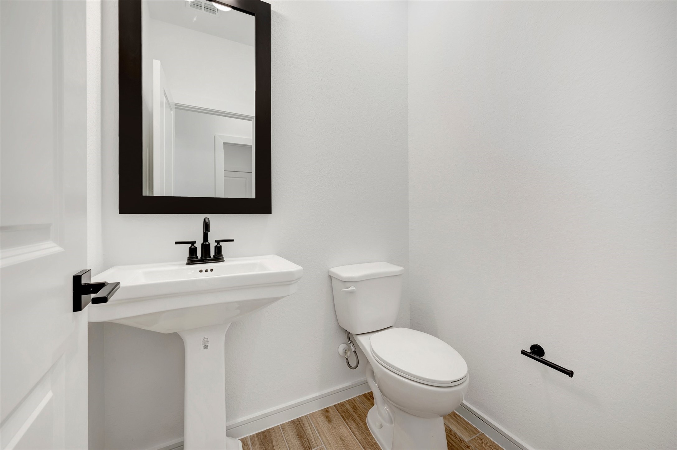 Half bath (*Photo not of actual home and used for illustration purposes only.)