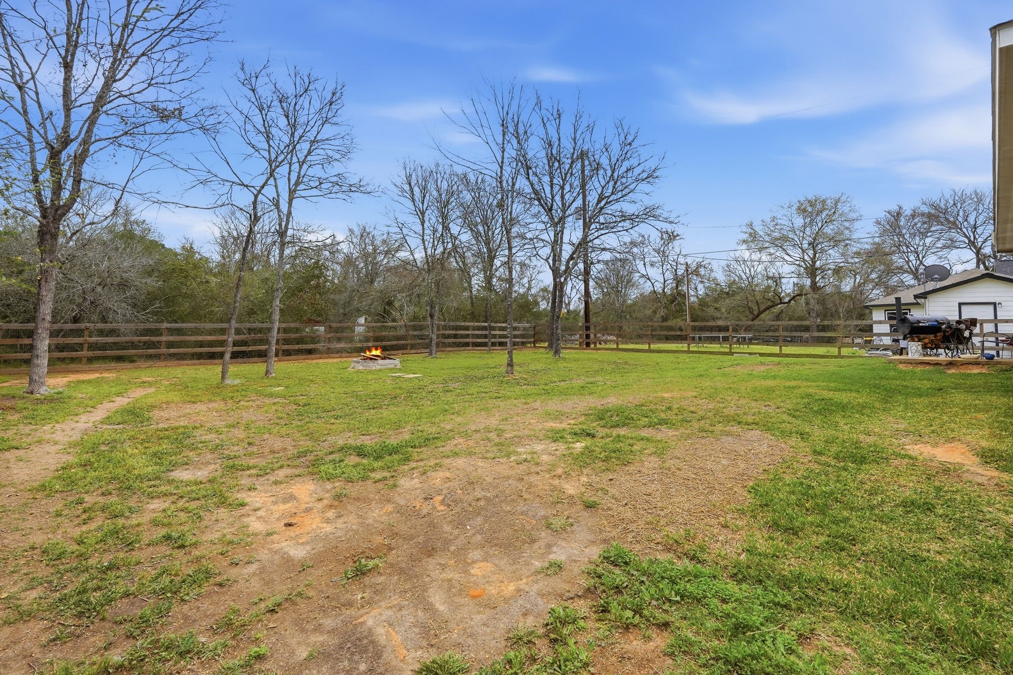Huge fenced in lot in the backyard