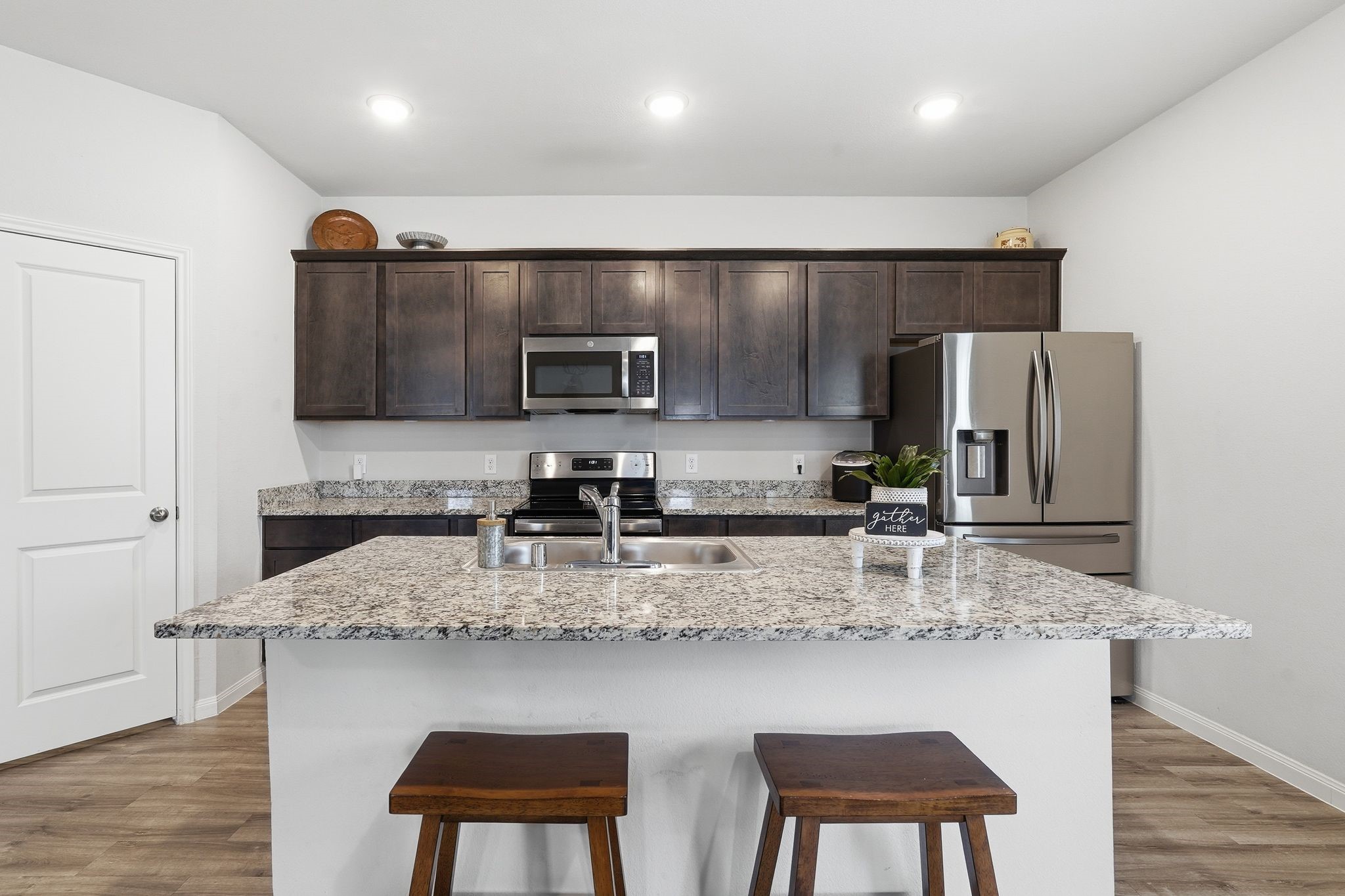 Large island and beautiful cabinetry