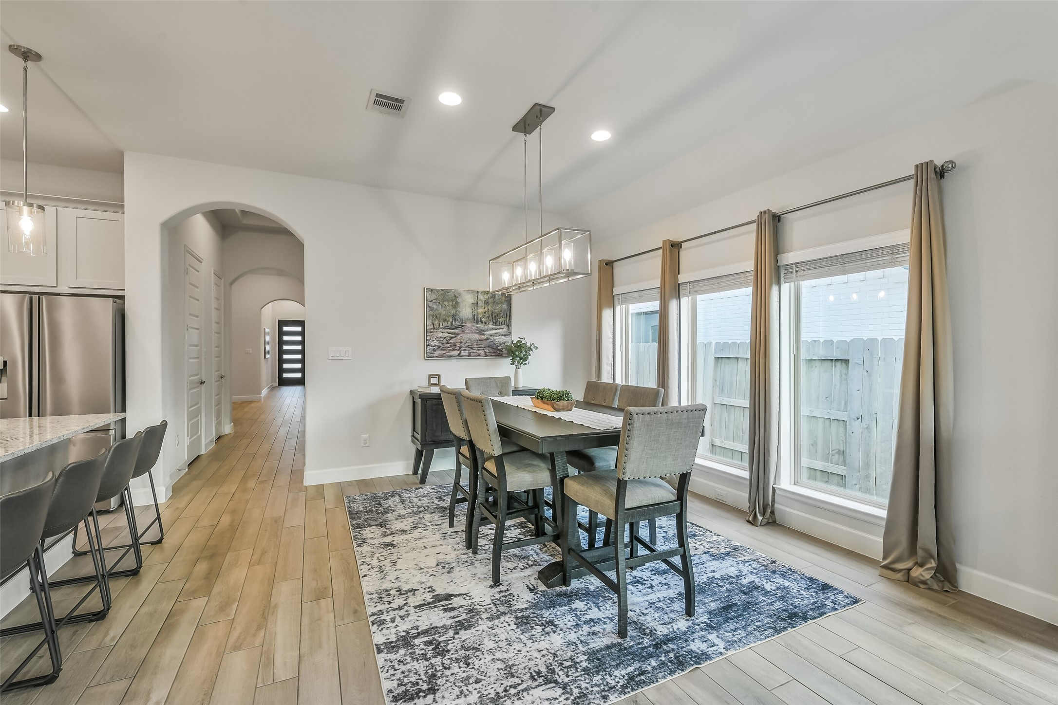 Windows allow for plenty of natural light in the kitchen and dining area.