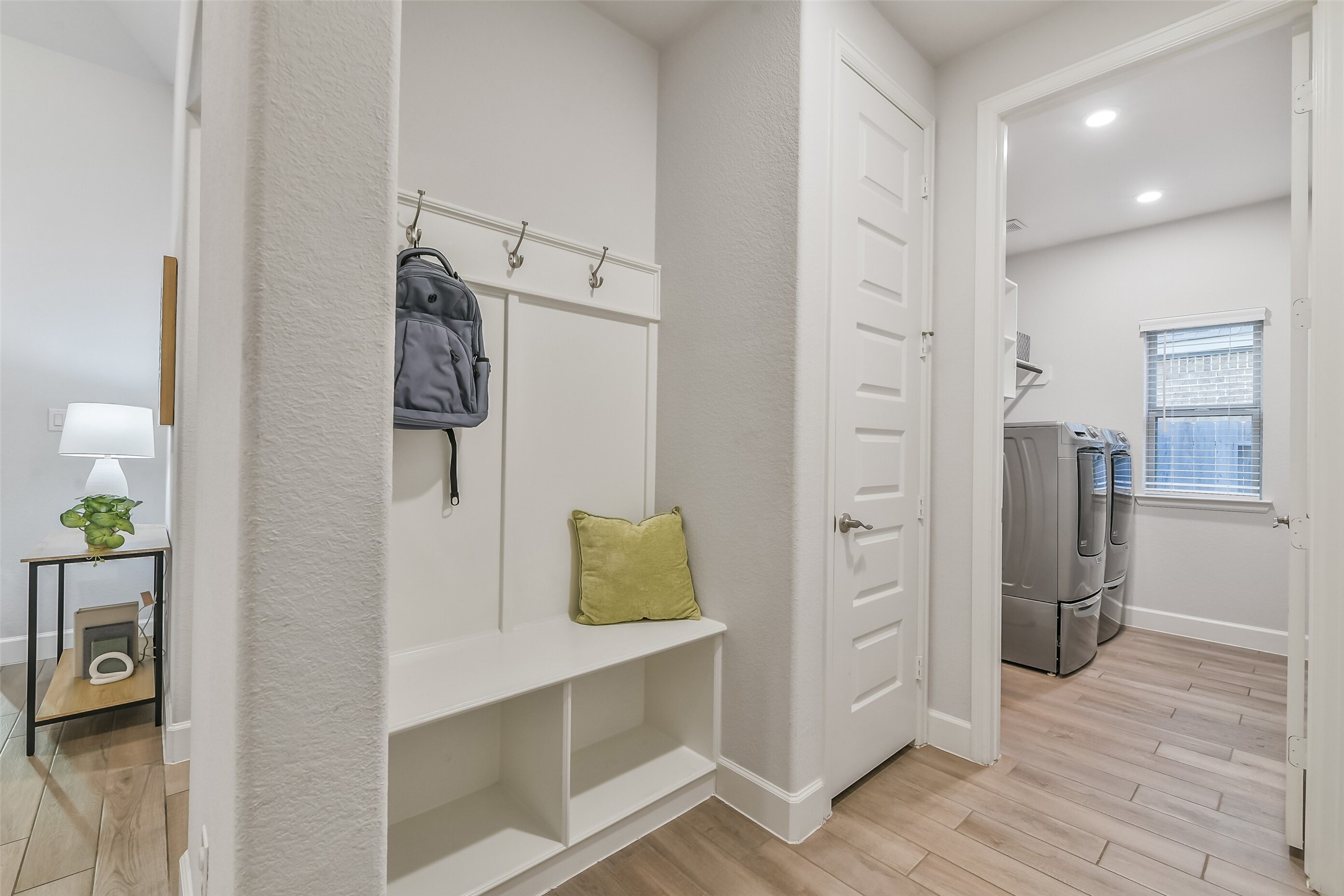 The mudroom and laundry room are directly off the garage entrance. The space also has a closet for extra storage.