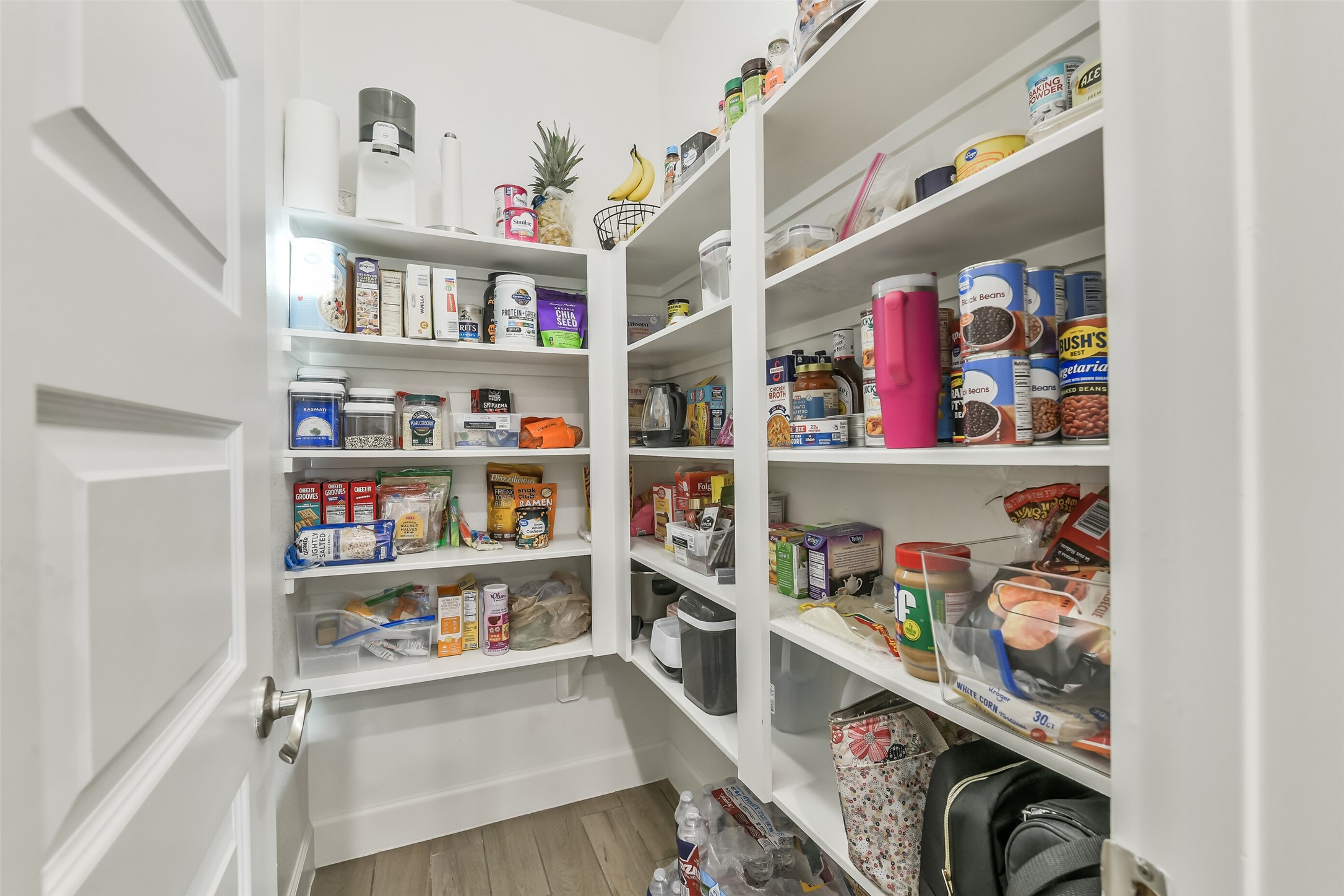 Oversized walk-in pantry with plenty of storage space.
