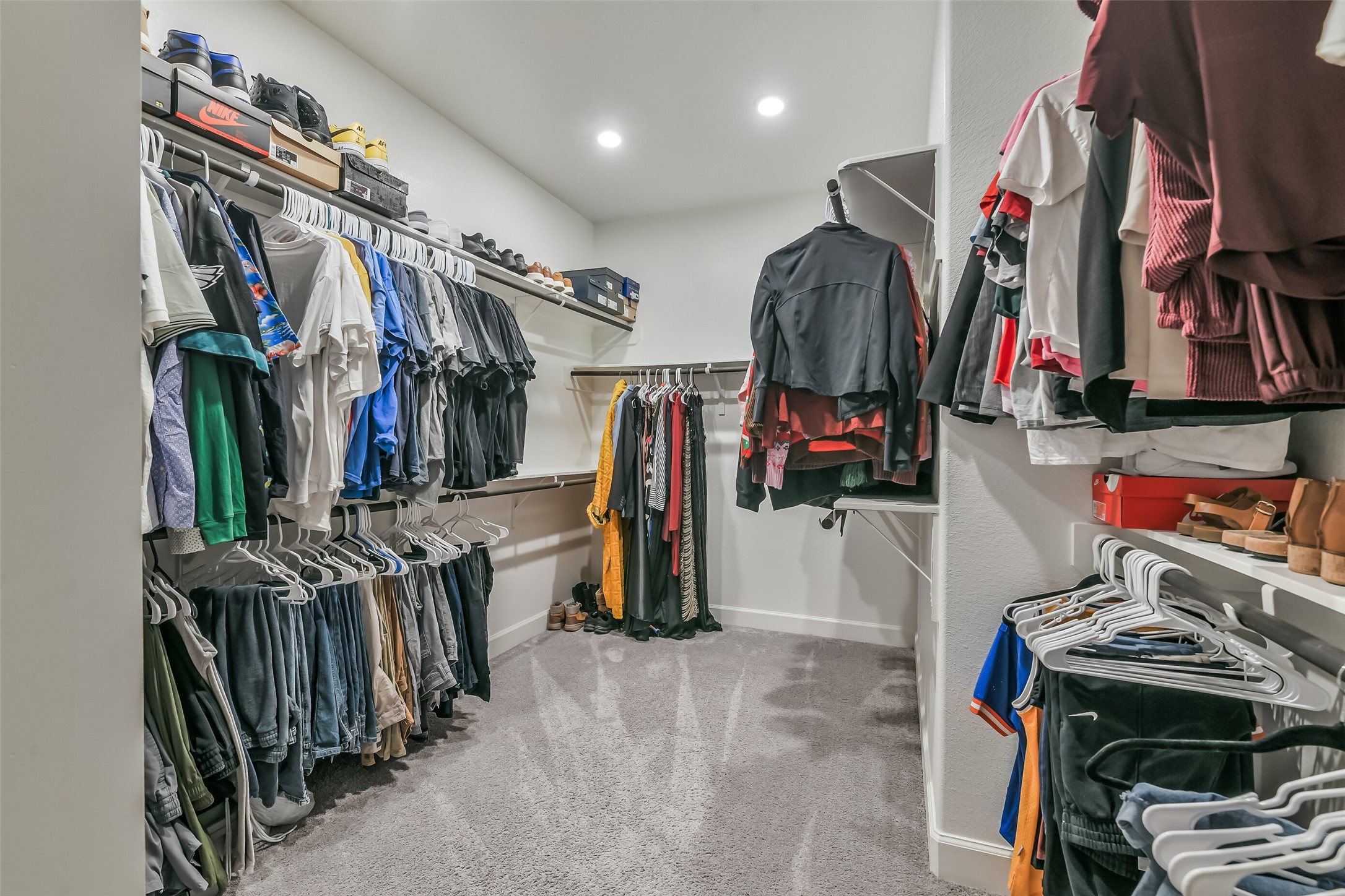 Oversized closet with an abundance of space.