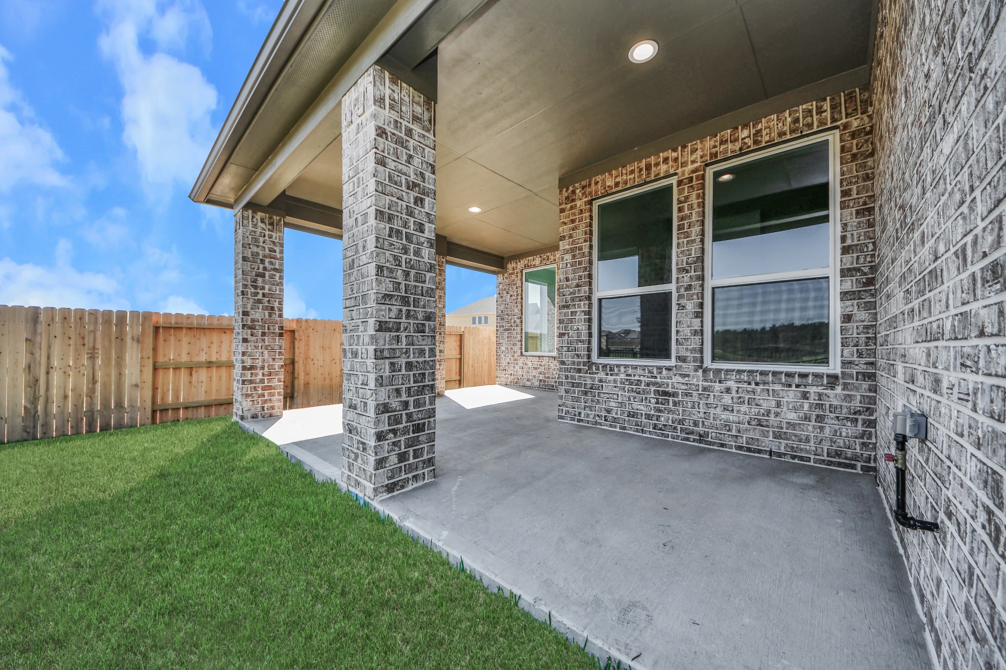 Explore the expansive backyard with its inviting covered patioa perfect blend of space for the kids to play and adults to unwind. Ideal for creating your outdoor oasis, this backyard accommodates patio furniture, a BBQ pit, and endless possibilities for leisure and entertainment.