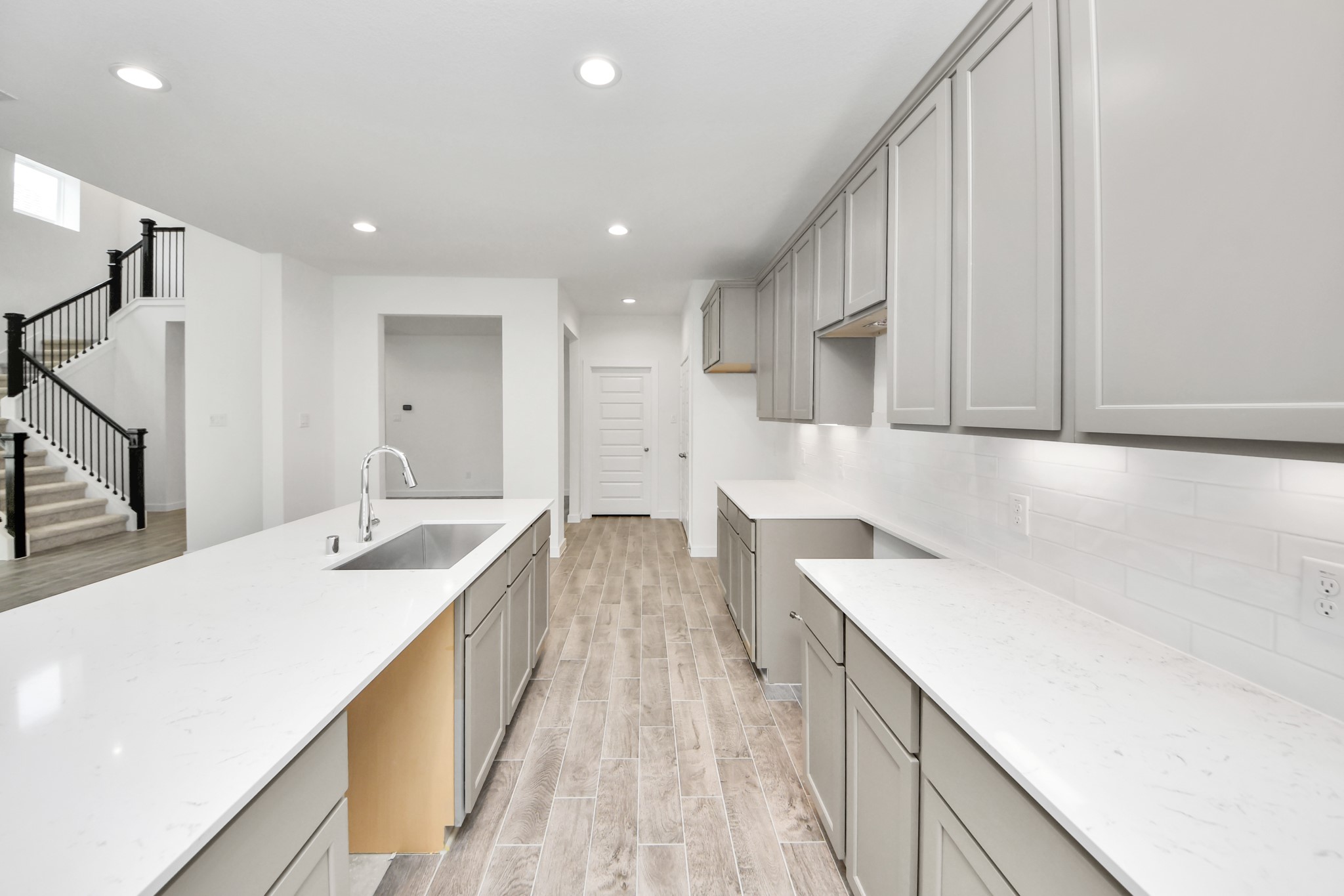 This generously spacious kitchen is a dream realized! Sample photo of completed home with similar floor plan. Actual colors and selections may vary.