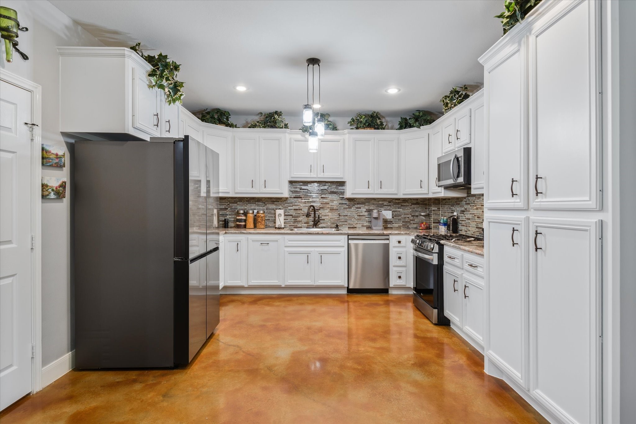 Lots of counter space and plenty of storage in the kitchen.