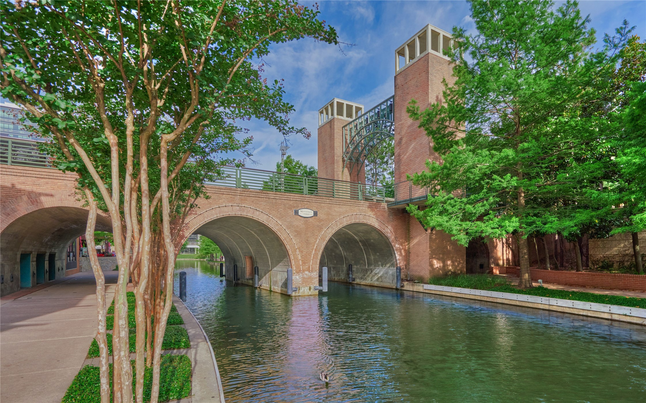 Experience the charm of The Woodlands Waterway, featuring scenic waterfront paths, vibrant dining, entertainment, and beautiful views in the heart of The Woodlands!