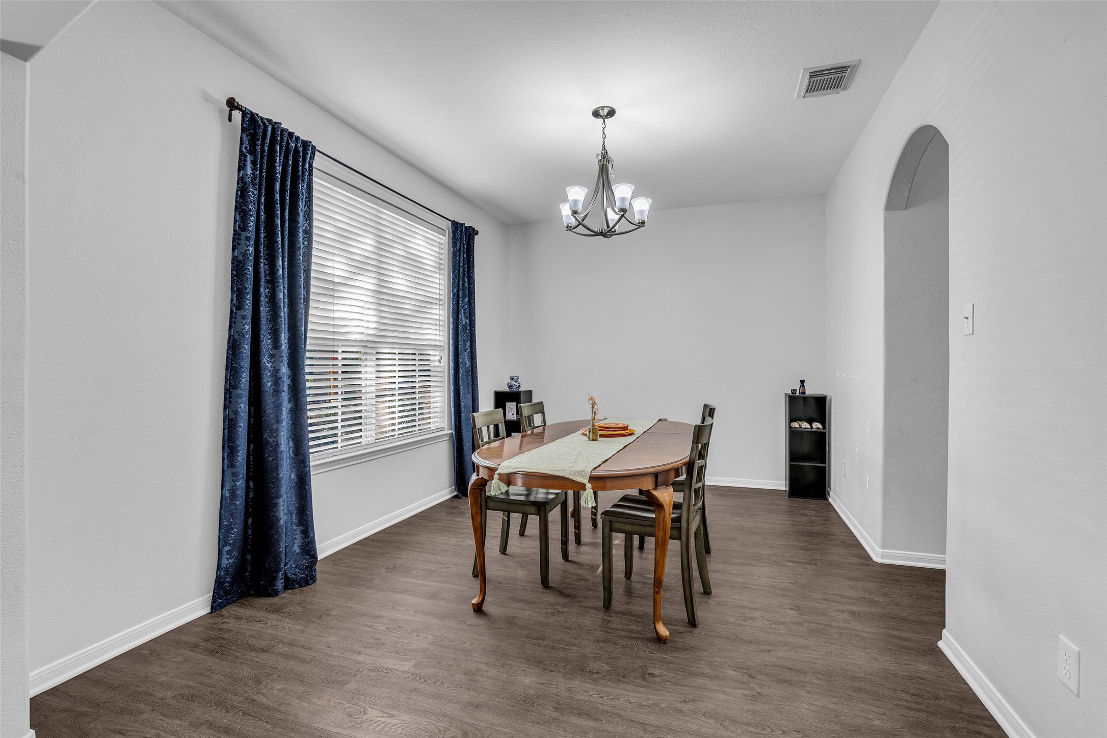 Dining room to the left of entry. Dining table available to stay with the lease.