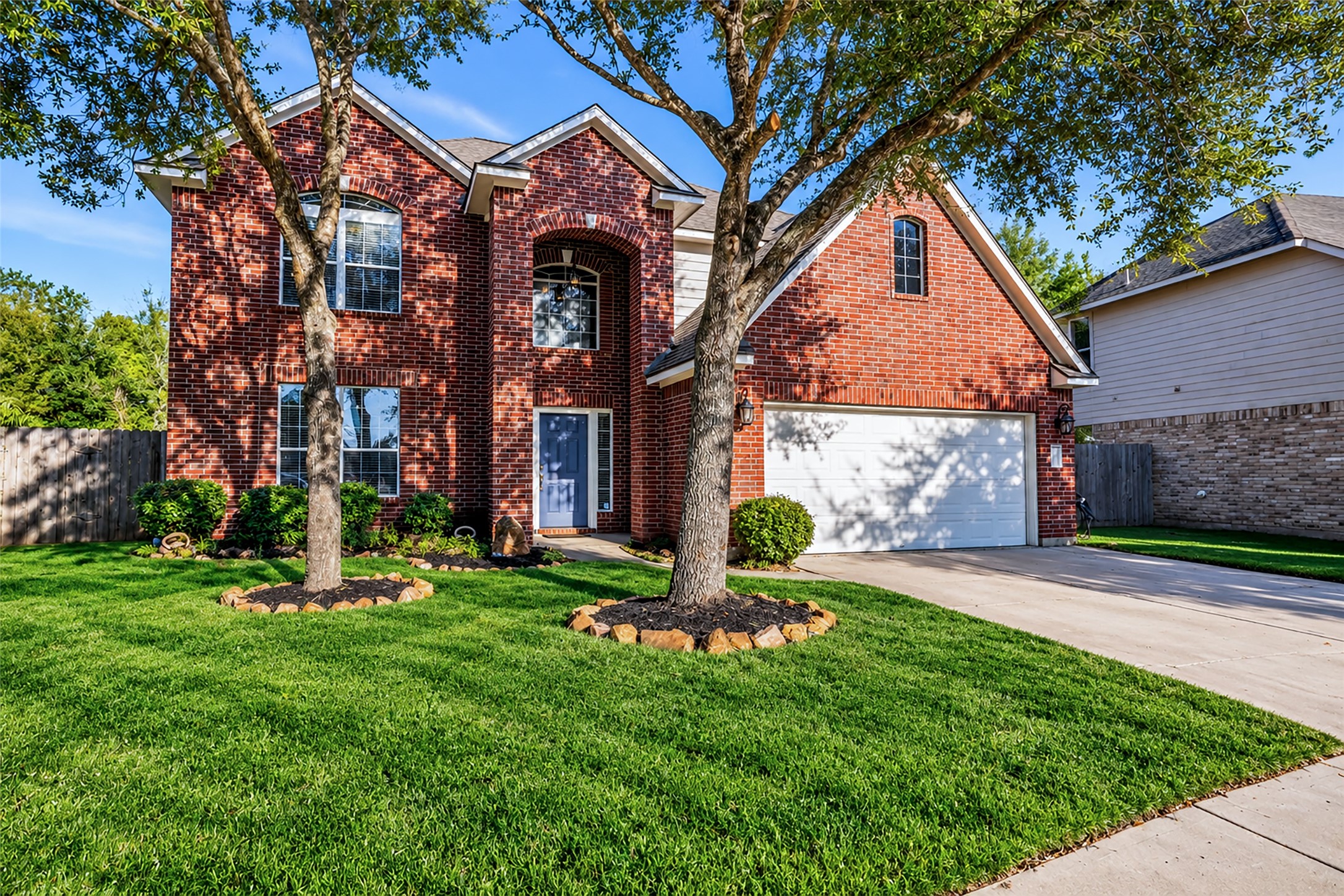 Nestled in a quiet cul-de-sac this private lot features no back neighbors and a wooded area behind the home.
