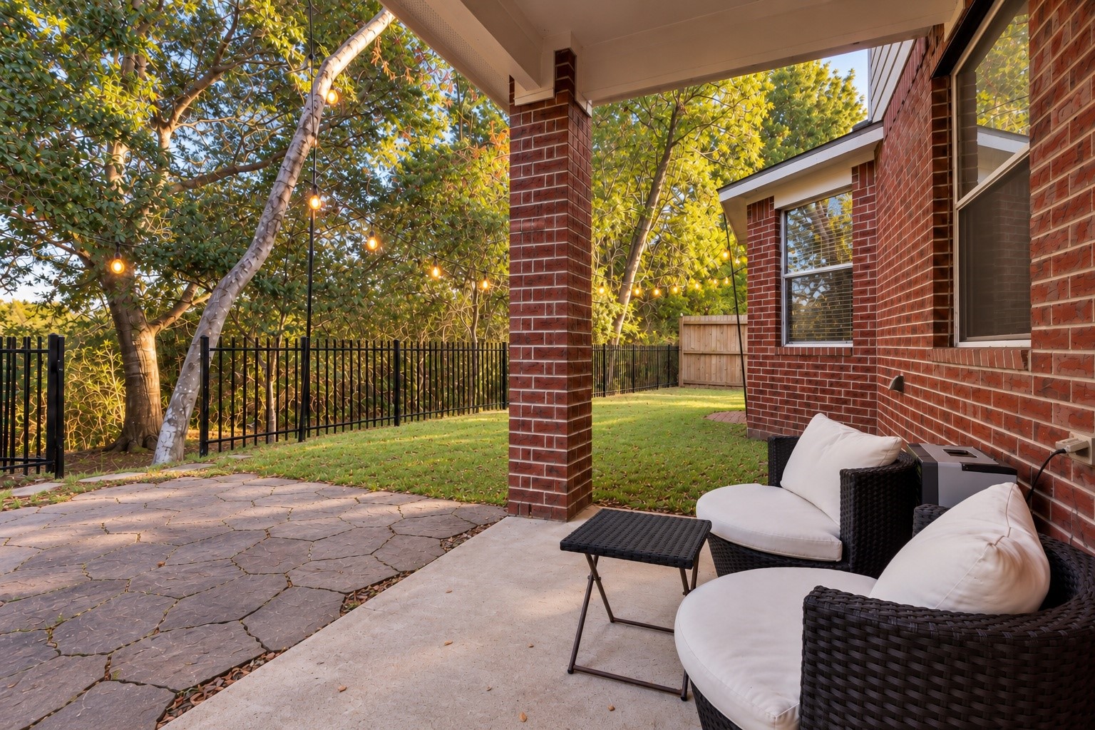 The covered back patio and private wooded backyard is possibly the best feature of this gem.