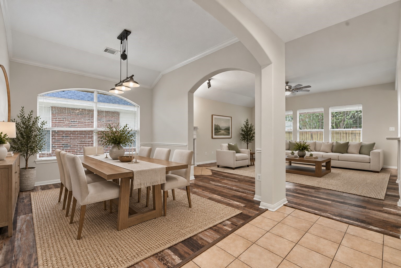 Elegant formal dining room that opens to the living room. (Virtually Staged) Elegant formal dining room that opens to the living room. (Virtually Staged)