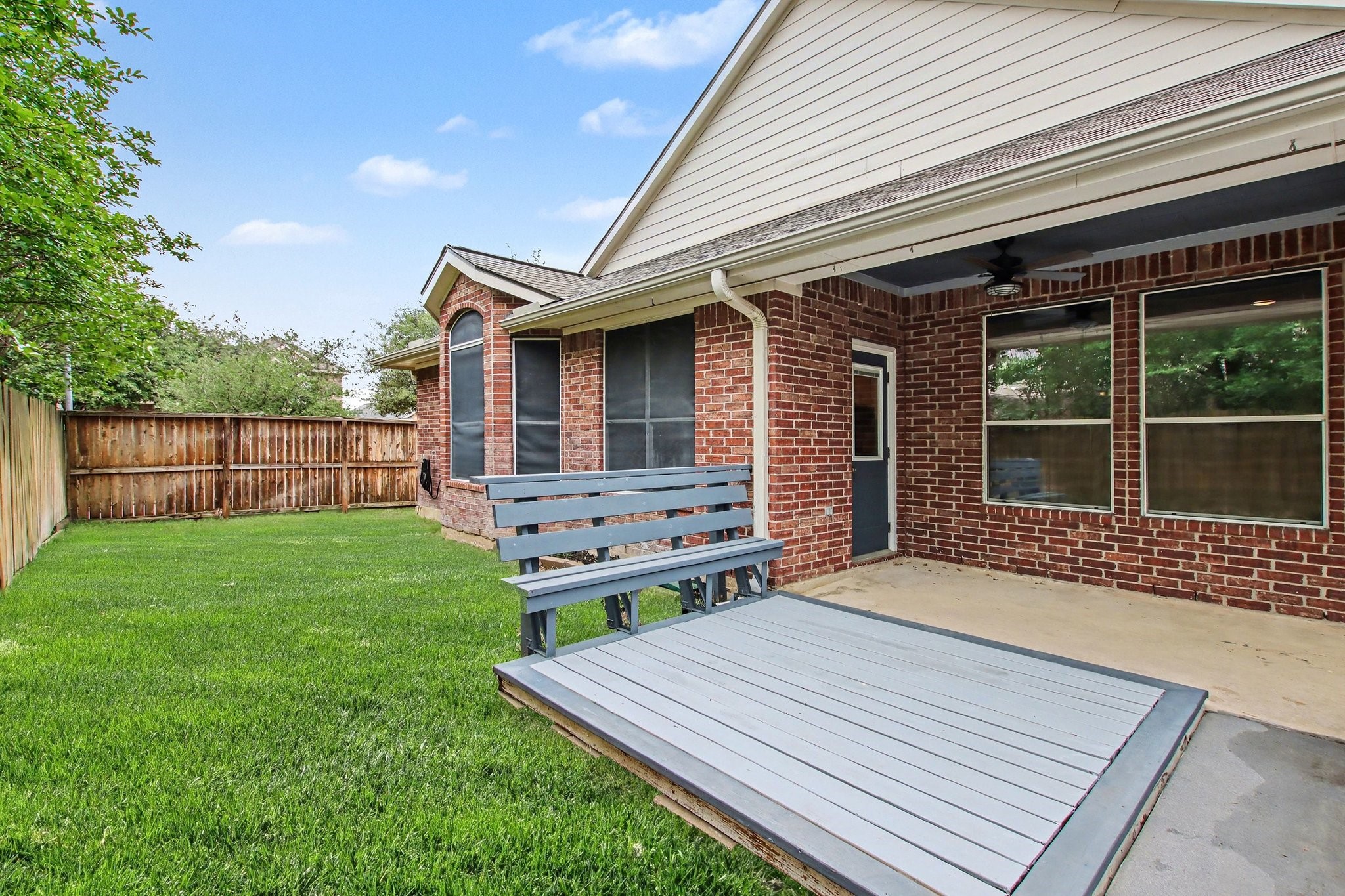 Off the extended deck is ample green space.