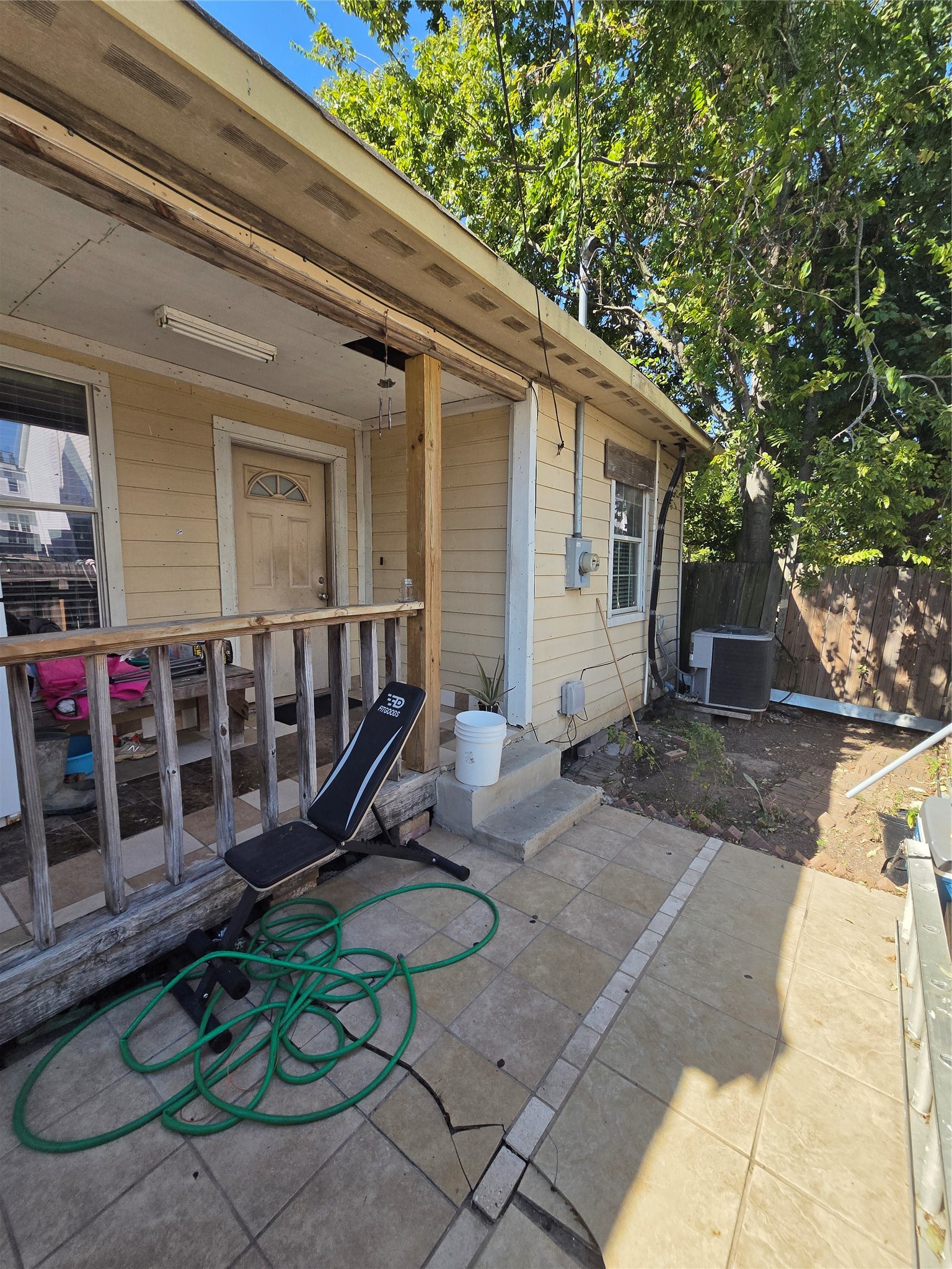 FENCED FRONT PORCH