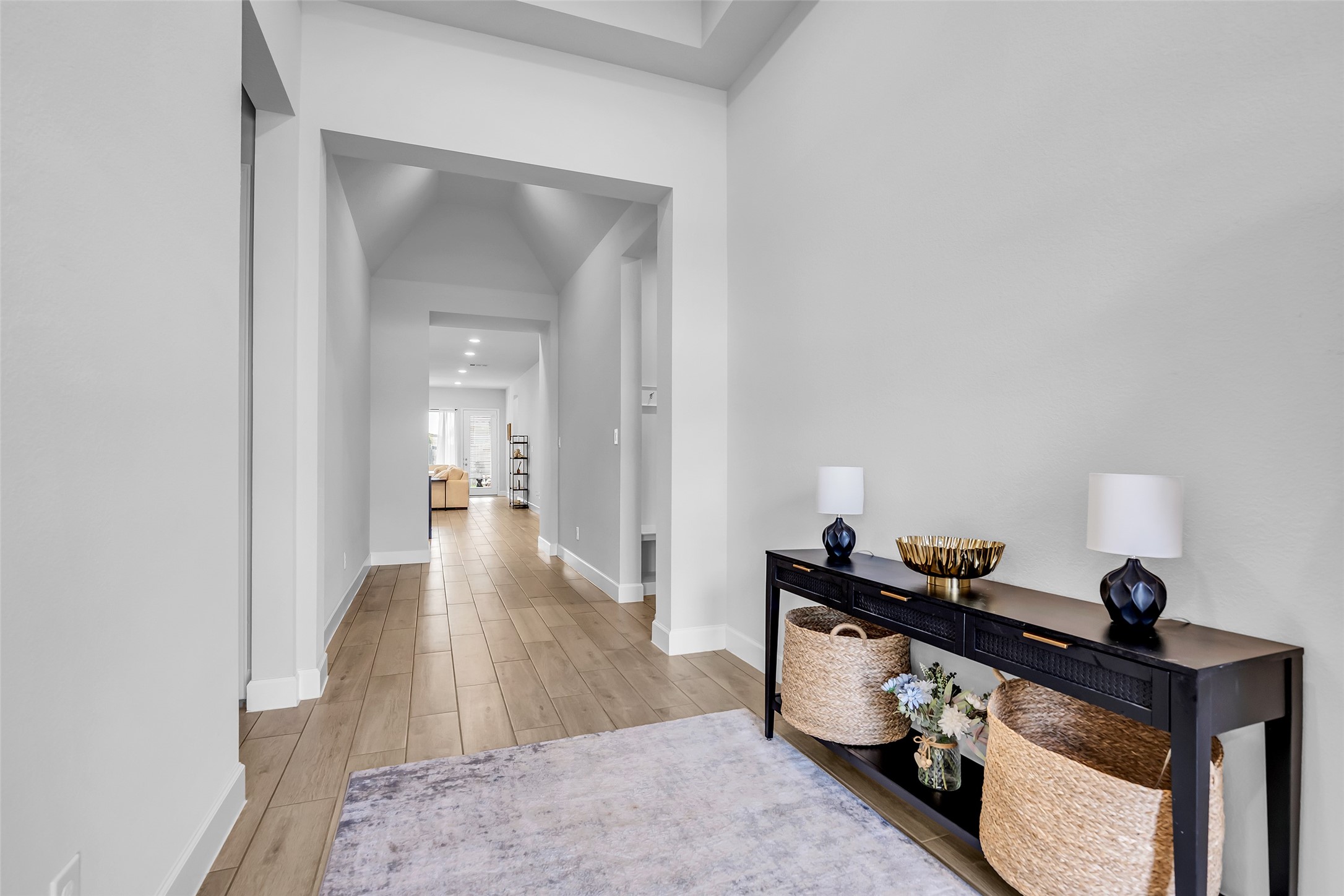 Your Inviting, Oversized Hallway Leads To A Bright, Open Living Space, Offering A Warm Welcome To Your New Home.