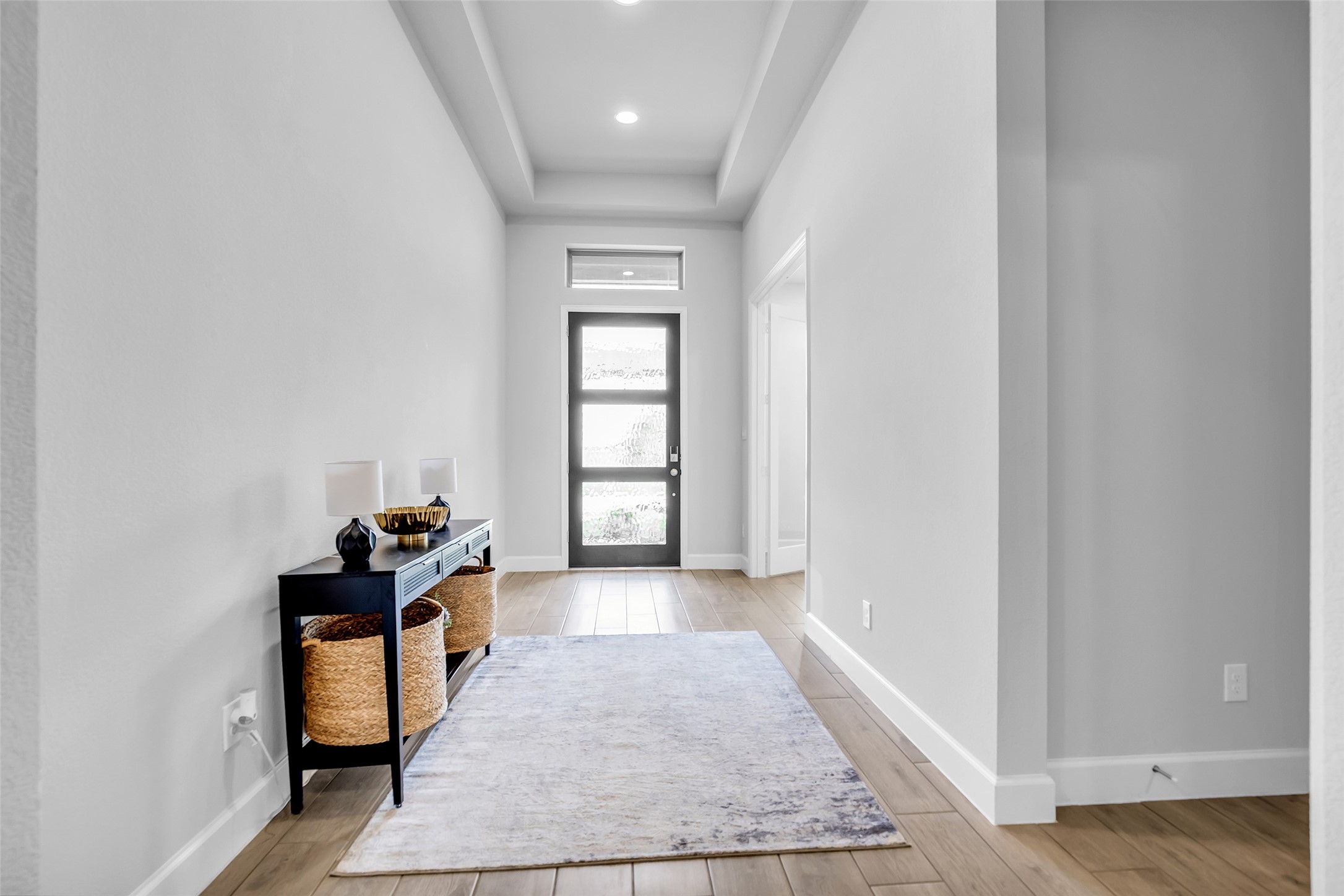 Your Signature, Perry Homes Entryway Ft. A High, Tray Ceiling & A Modern Front Door Allows For An Abundance of Natural Light.