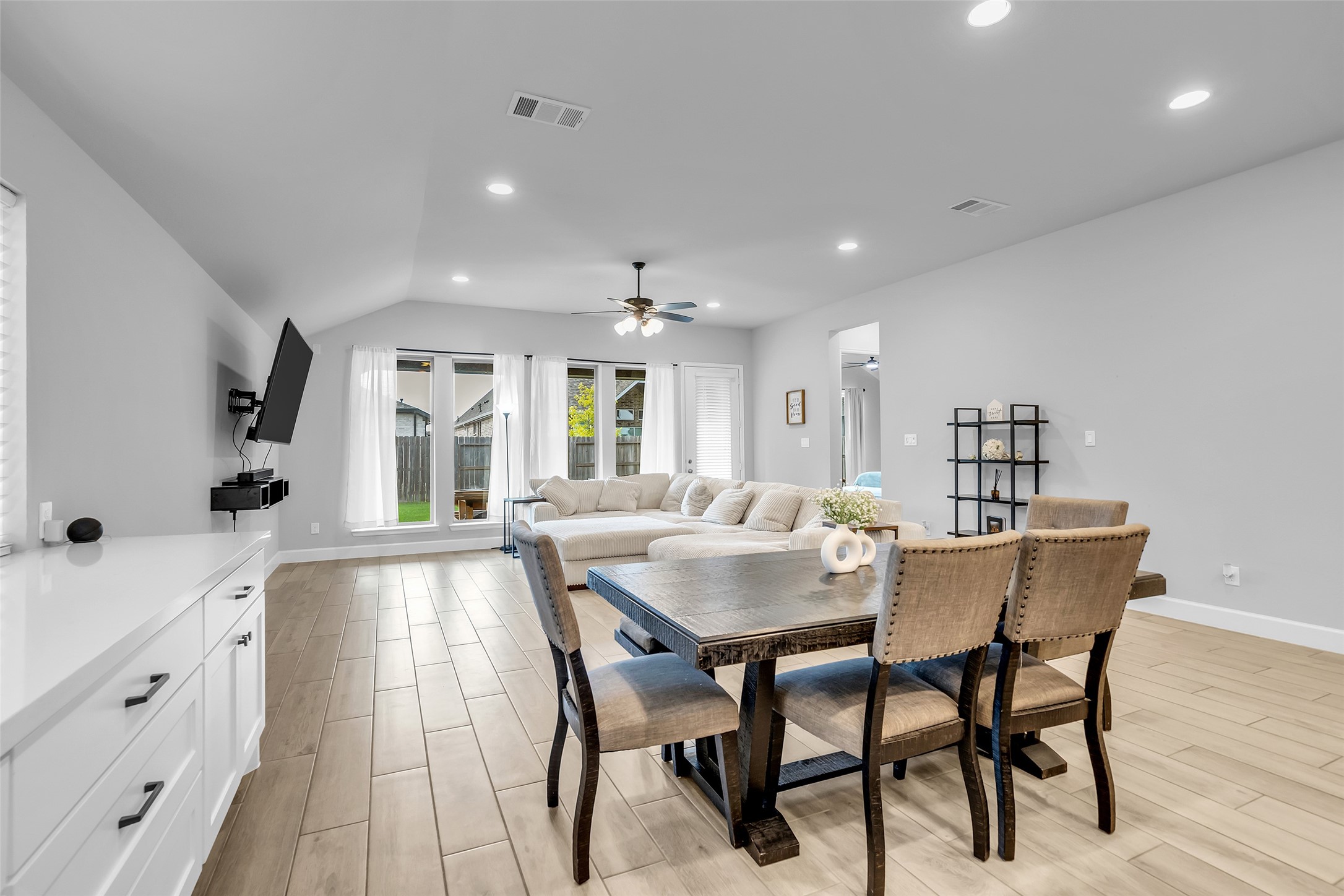Spacious, Flowing, & Elegant: Modern Finishes, Wood Plank Tiling, Floor to Ceiling Windows For Ample, Natural Light.