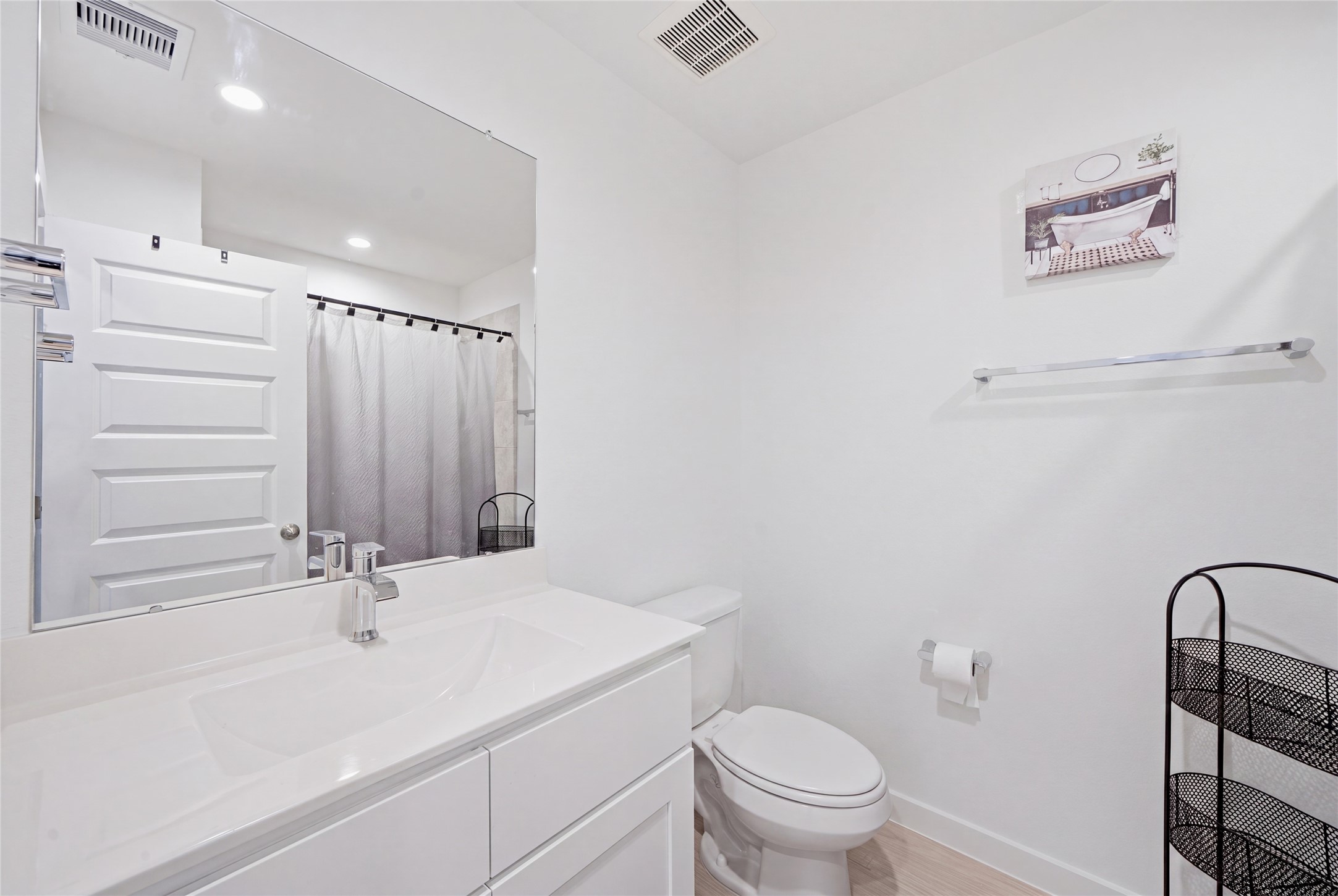 The hall bath is available for your guests and serves the secondary bedrooms.