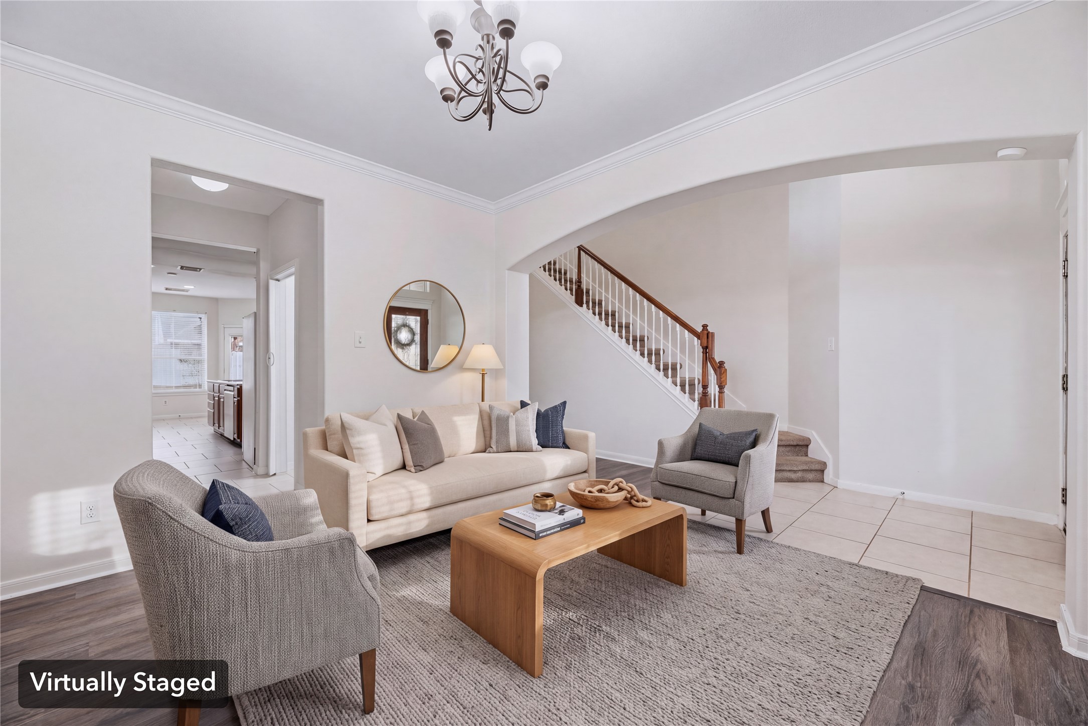 Virtually staged to show a comfortable front sitting area, with an open connection to the foyer. Furniture shown is digital. Virtually staged to show a comfortable front sitting area, with an open connection to the foyer. Furniture shown is digital.