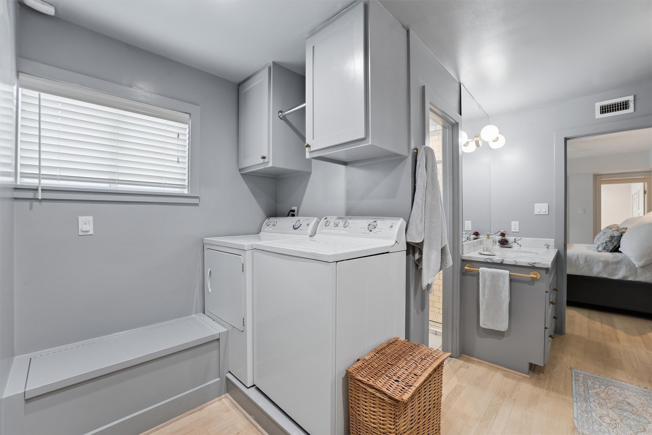 Primary bath, vanity, closet and laundry are all together - accessible only through the primary bedroom.
