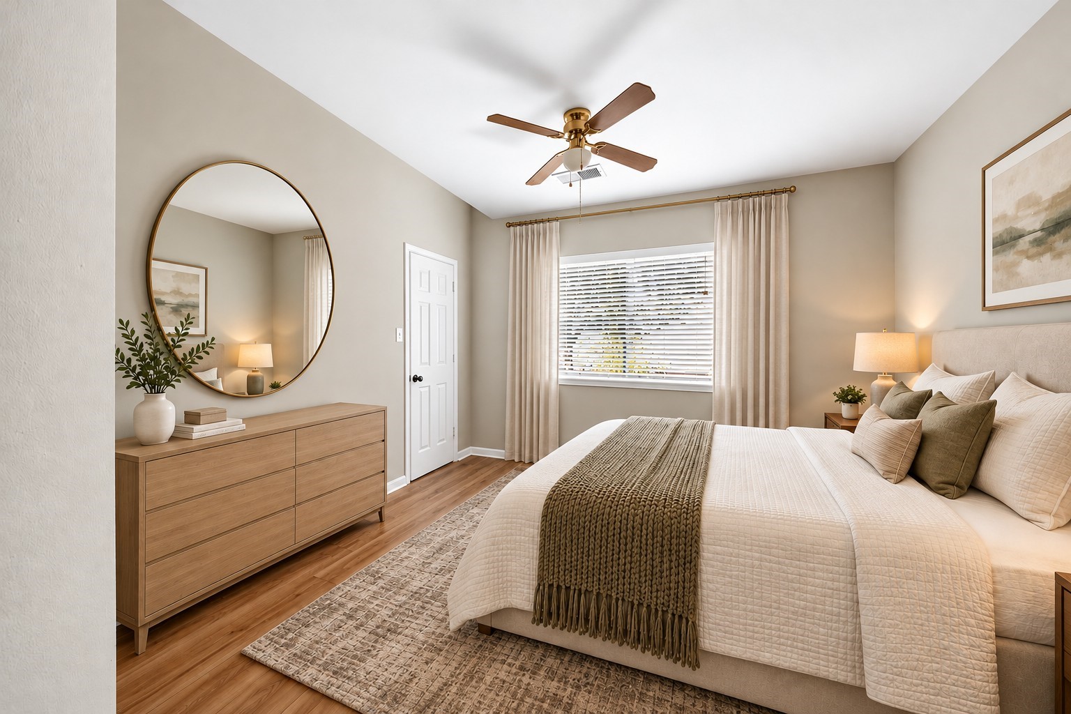 Secondary Bedroom  Alternate View: Bright secondary bedroom with a large window, neutral finishes and warm wood-look flooring, creating an inviting atmosphere.