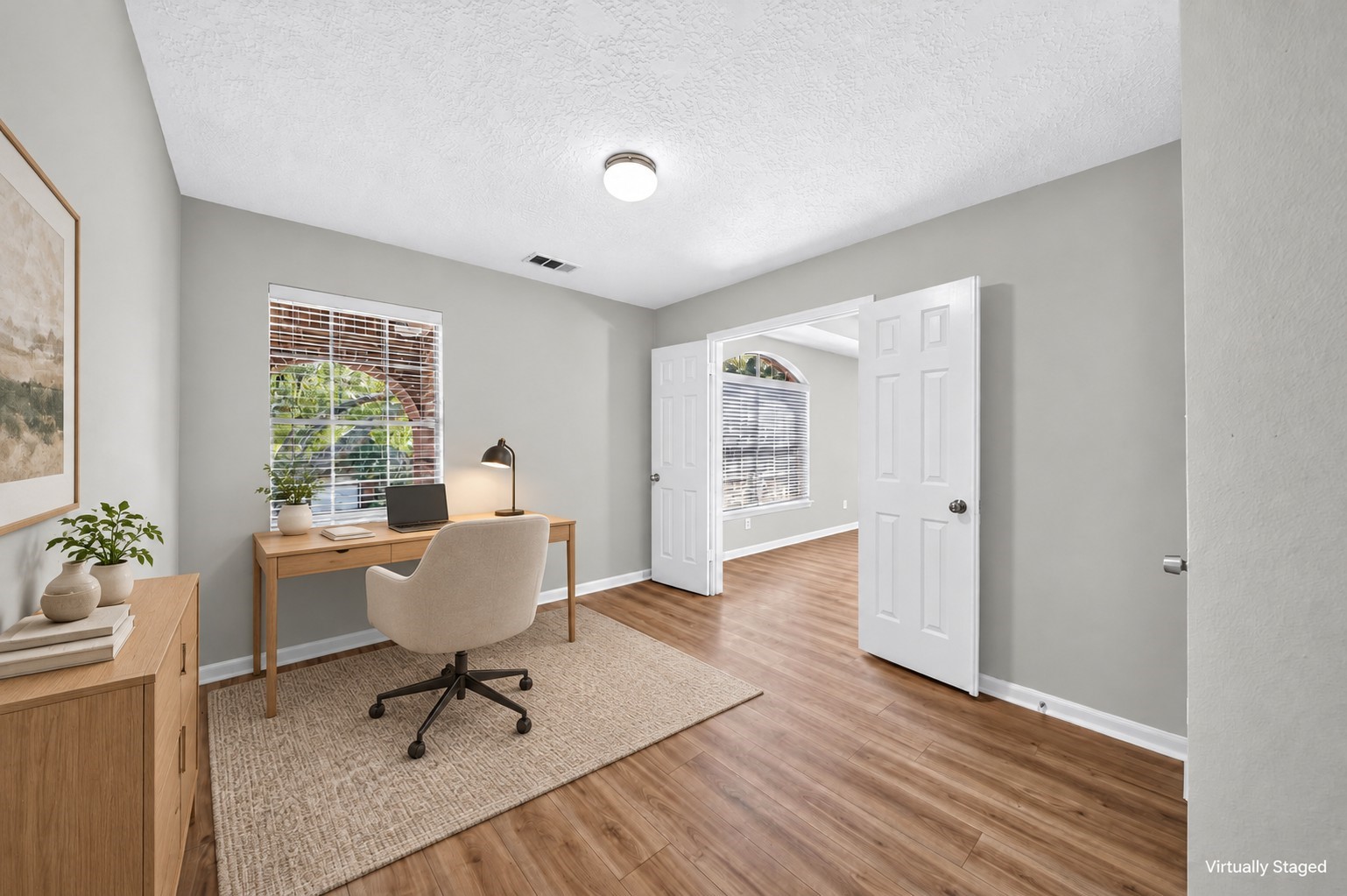 Office  Alternate View: A second view highlights the room's flexible layout, spacious floor area and double-door opening, offering possibilities for work, hobbies or additional bedroom us