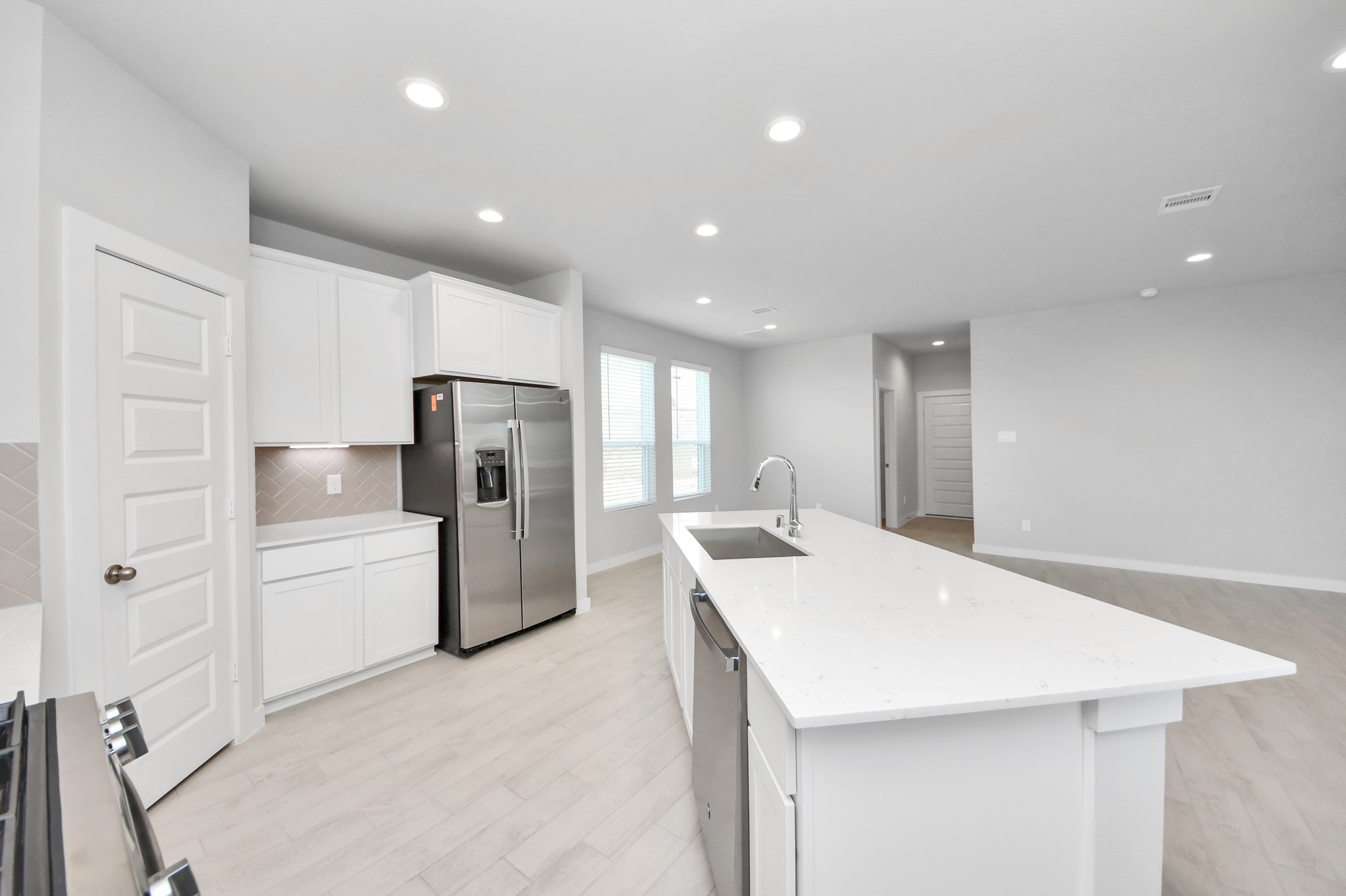 This generously spacious kitchen is a dream realized! Sample photo of completed home with similar floor plan. Actual colors and selections may vary.