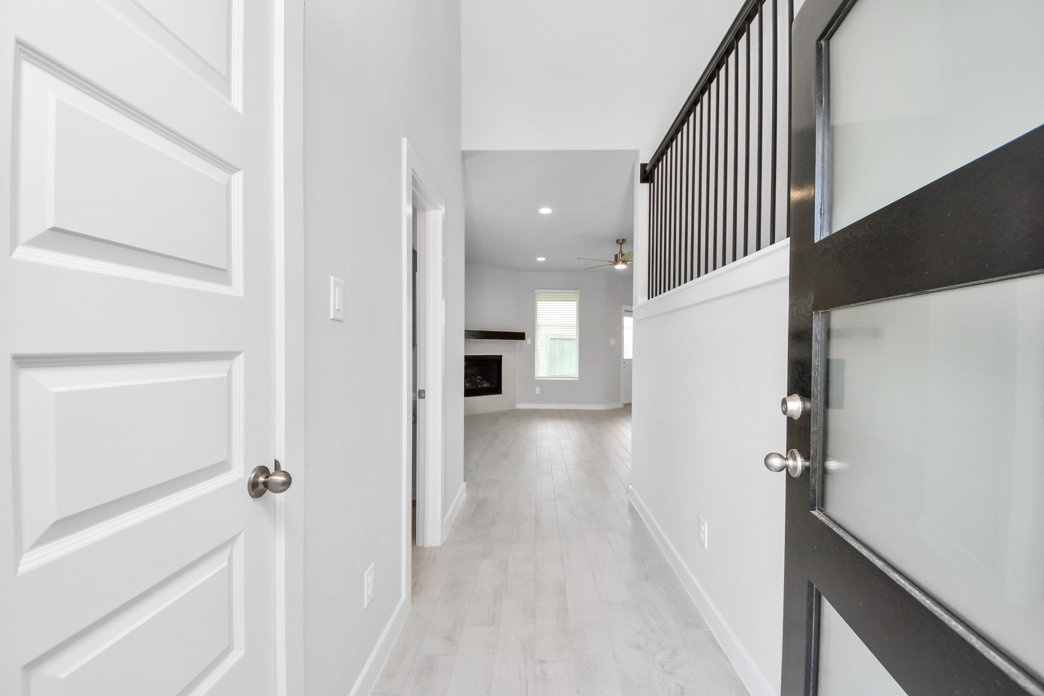 As you step into the threshold of this luxurious home, you'll soon be welcomed by an elegant glass door (to be installed). Inside, soaring ceilings amplify the spaciousness, while the refined wood-look tile flooring and oversized baseboards exude sophistication and charm. Sample photo of completed home with similar floor plan. Actual colors and selections may vary.