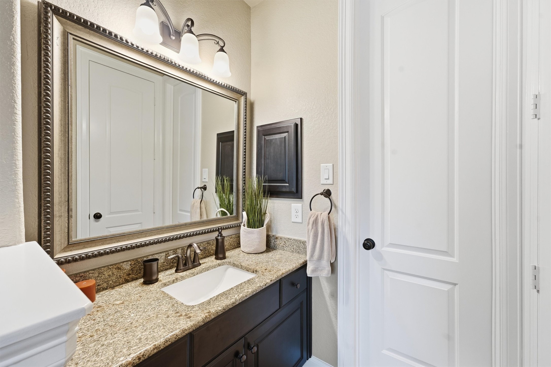 Full guest bath downstairs- hollywood for access from the guest bedroom or living room.