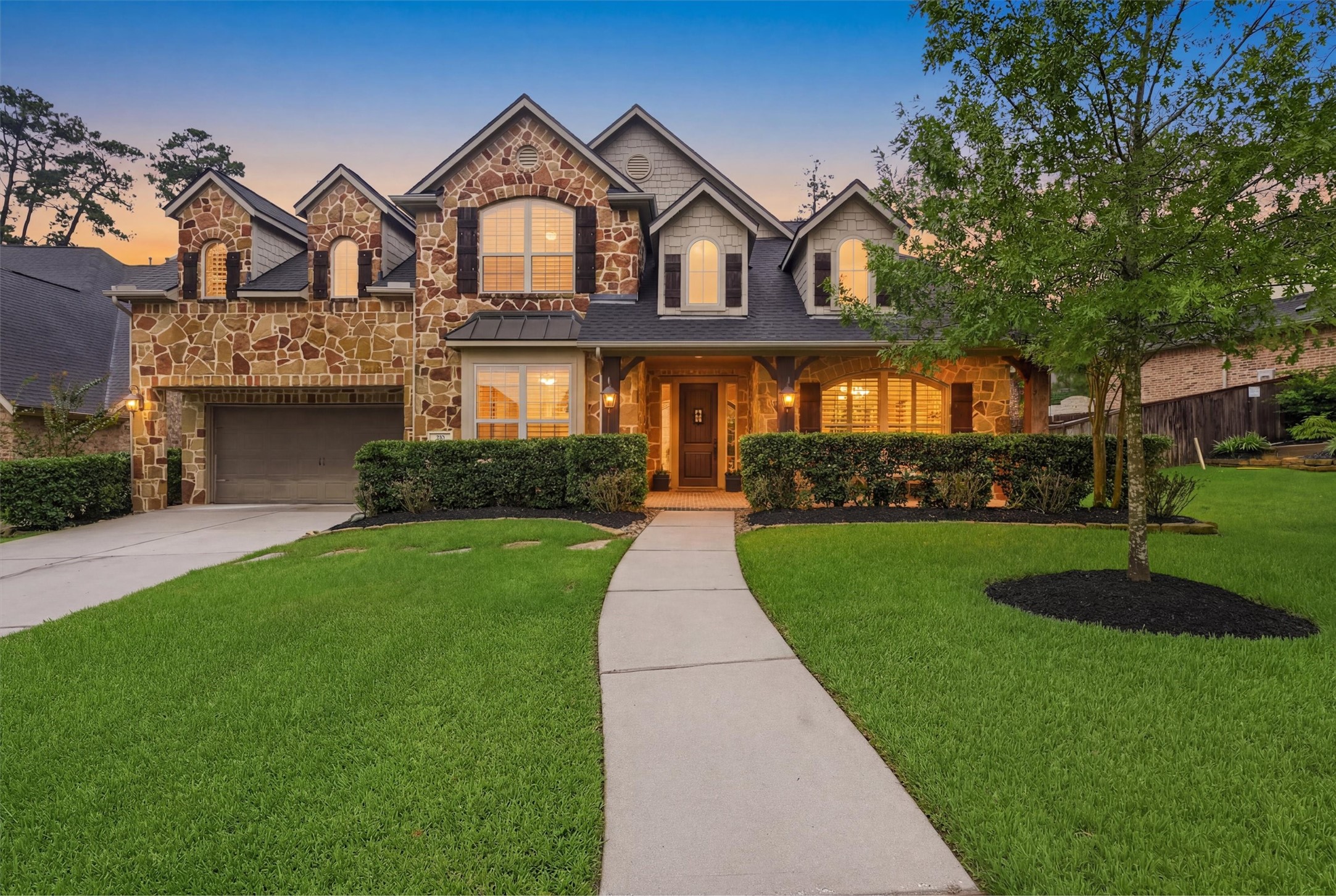 Timeless curb appeal with beautiful landscaping