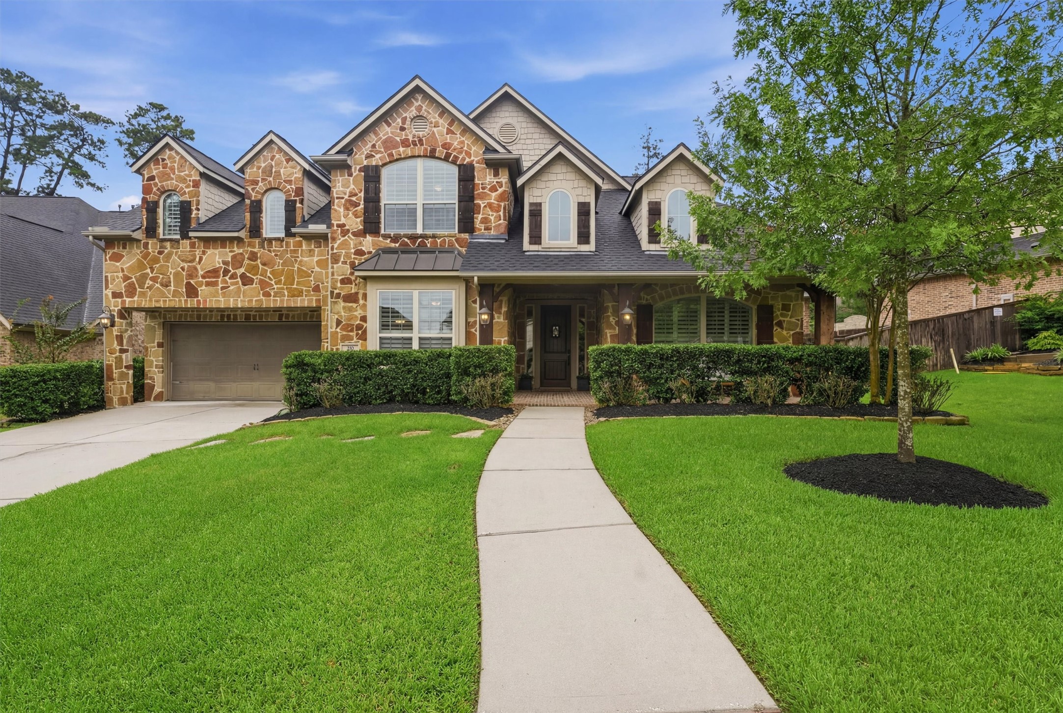 Welcome to 210 Fox Squirrel Court on this inviting covered front porch Welcome to 210 Fox Squirrel Court on this inviting covered front porch