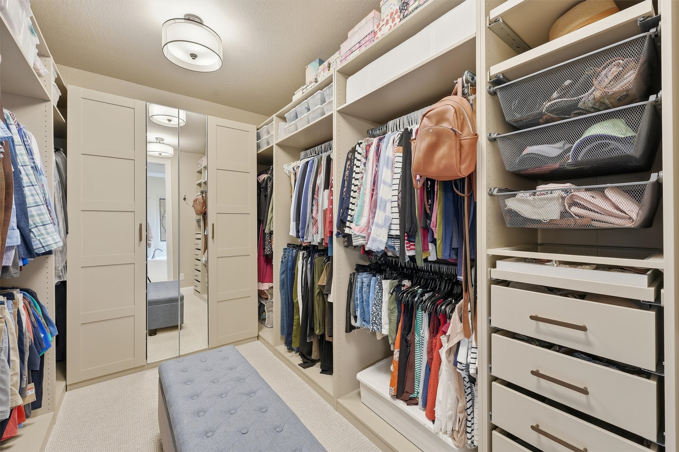 Expansive primary closet with excellent storage.