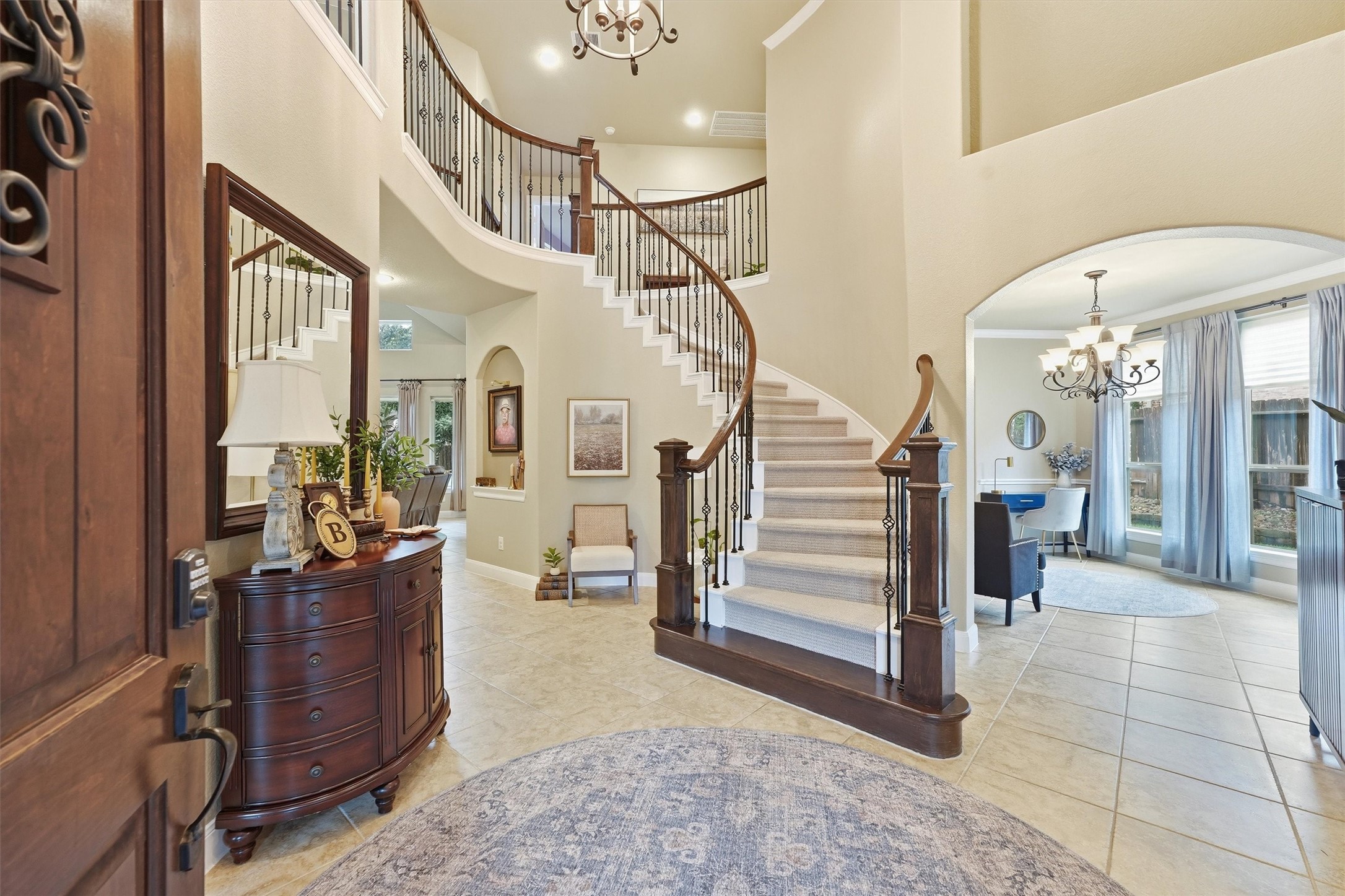 Grand entry with soaring ceilings.