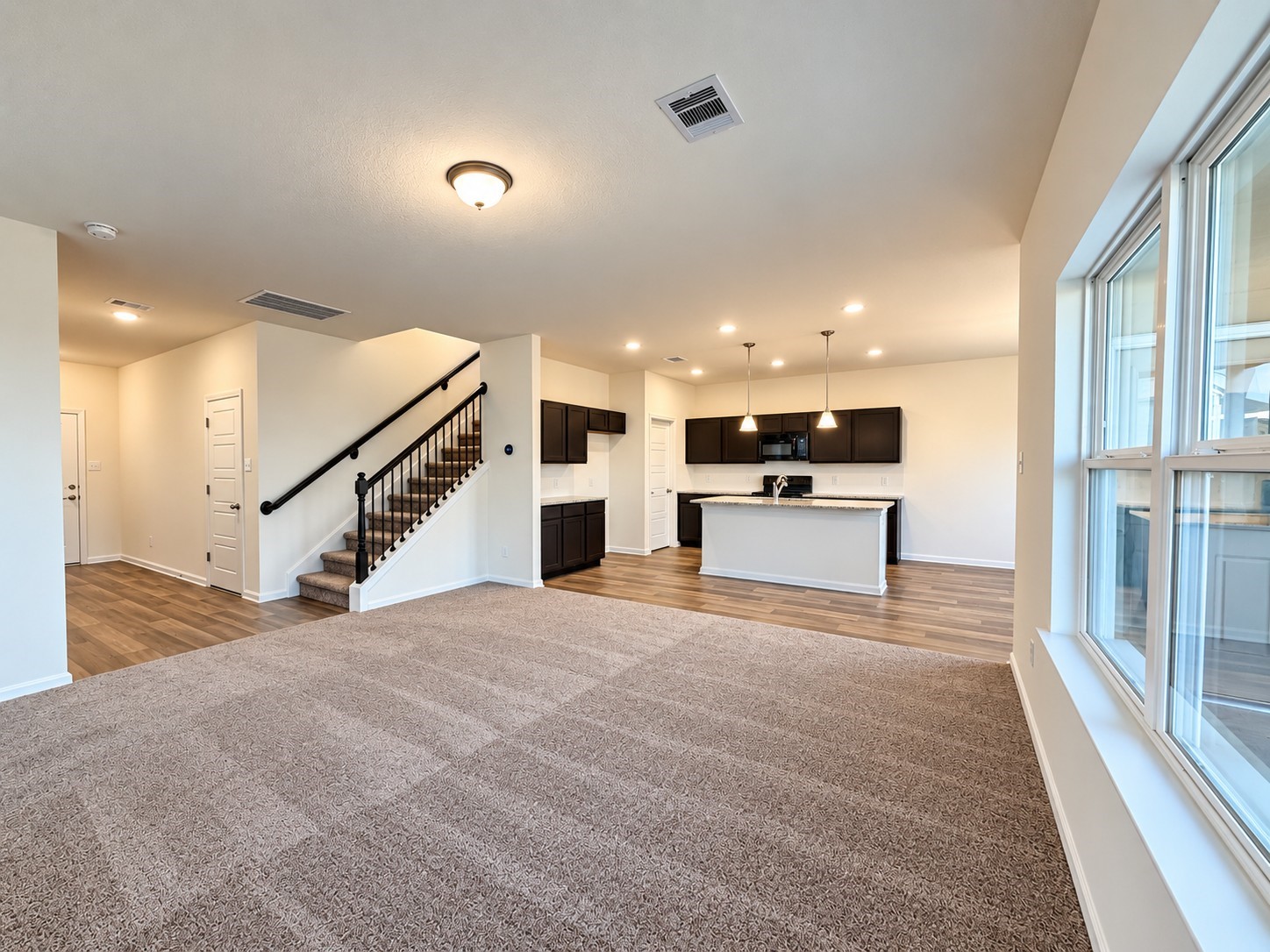 The Oriole II- Family Room into Kitchen