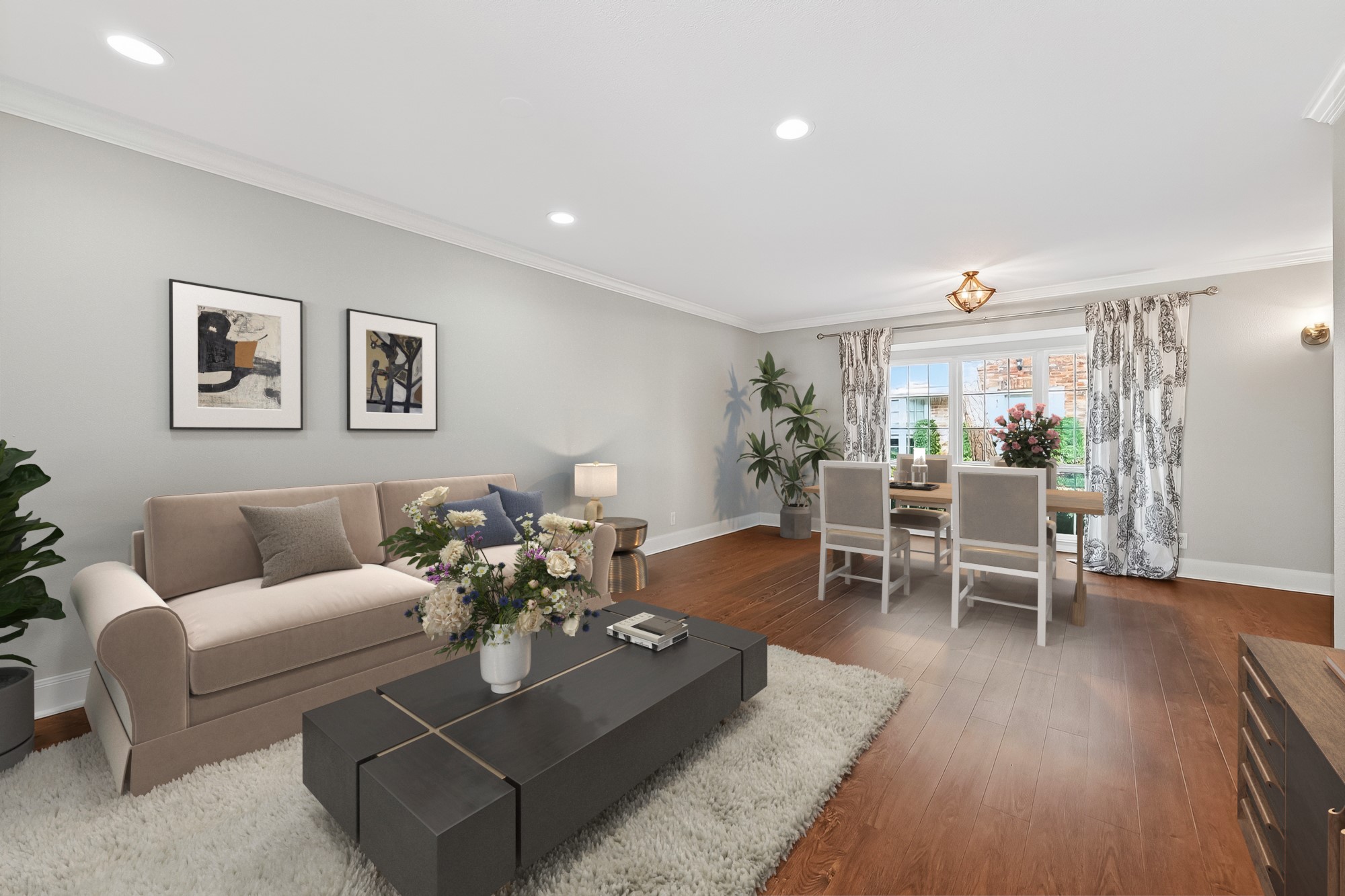 Bright living and dining space in this updated Houston townhome featuring modern finishes and flexible entertaining areas.
