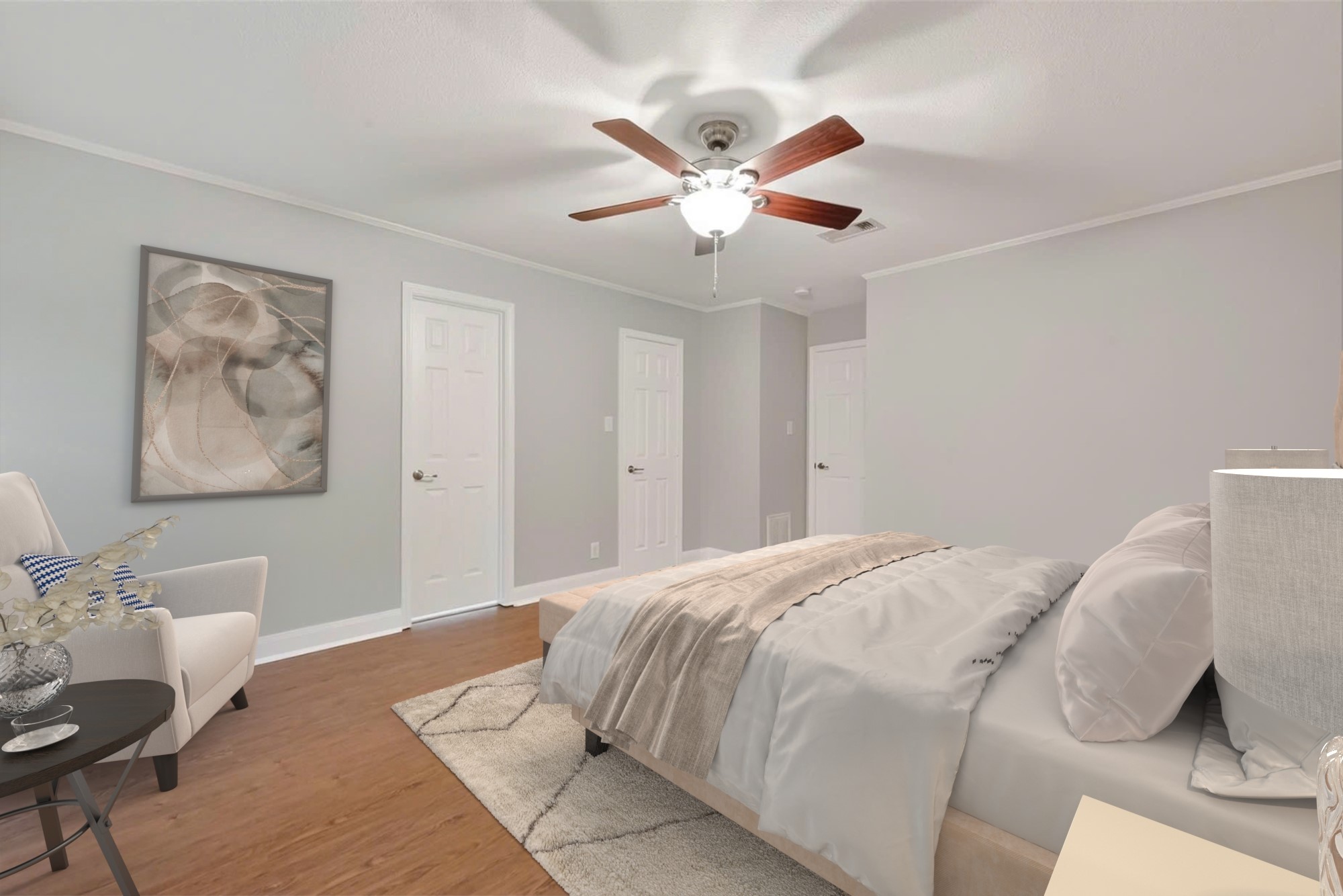 Large primary bedroom retreat in this updated Houston townhome with stylish finishes and custom closet access.