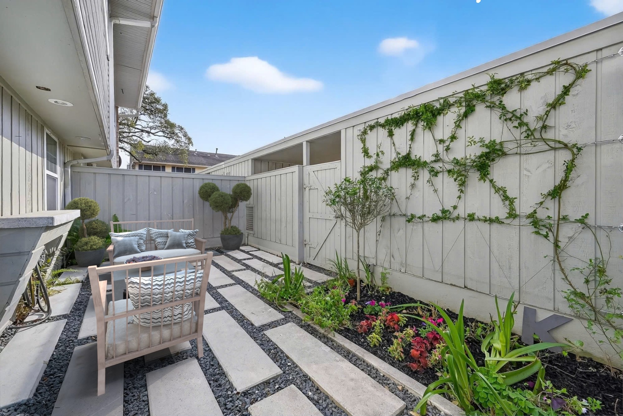 Beautiful outdoor patio space with modern upgrades and low-maintenance design in this Briar Grove townhome.