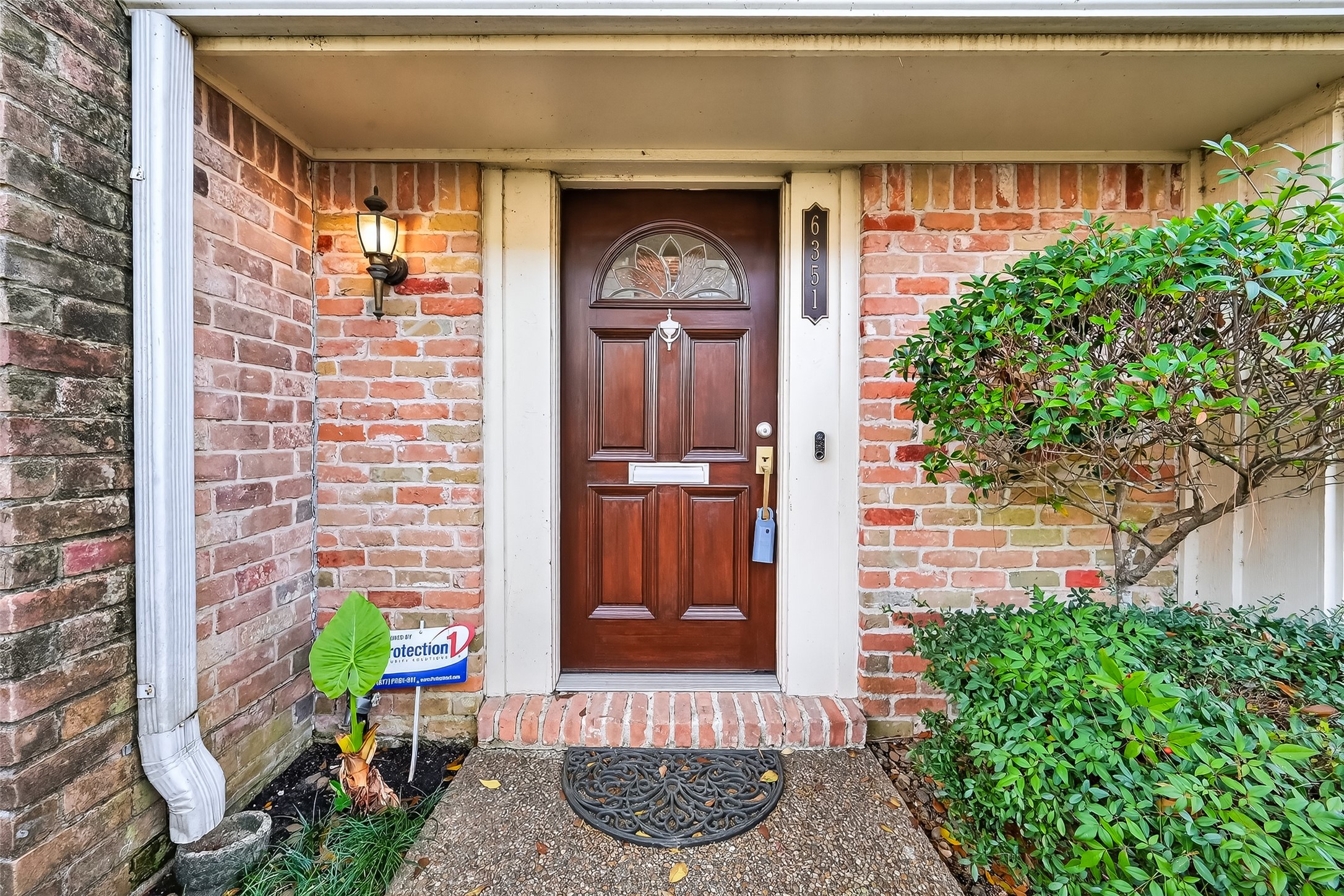 Updated townhome in the desirable Briar Grove Drive Townhome community near the Galleria in Houston with manicured landscaping and charming curb appeal.