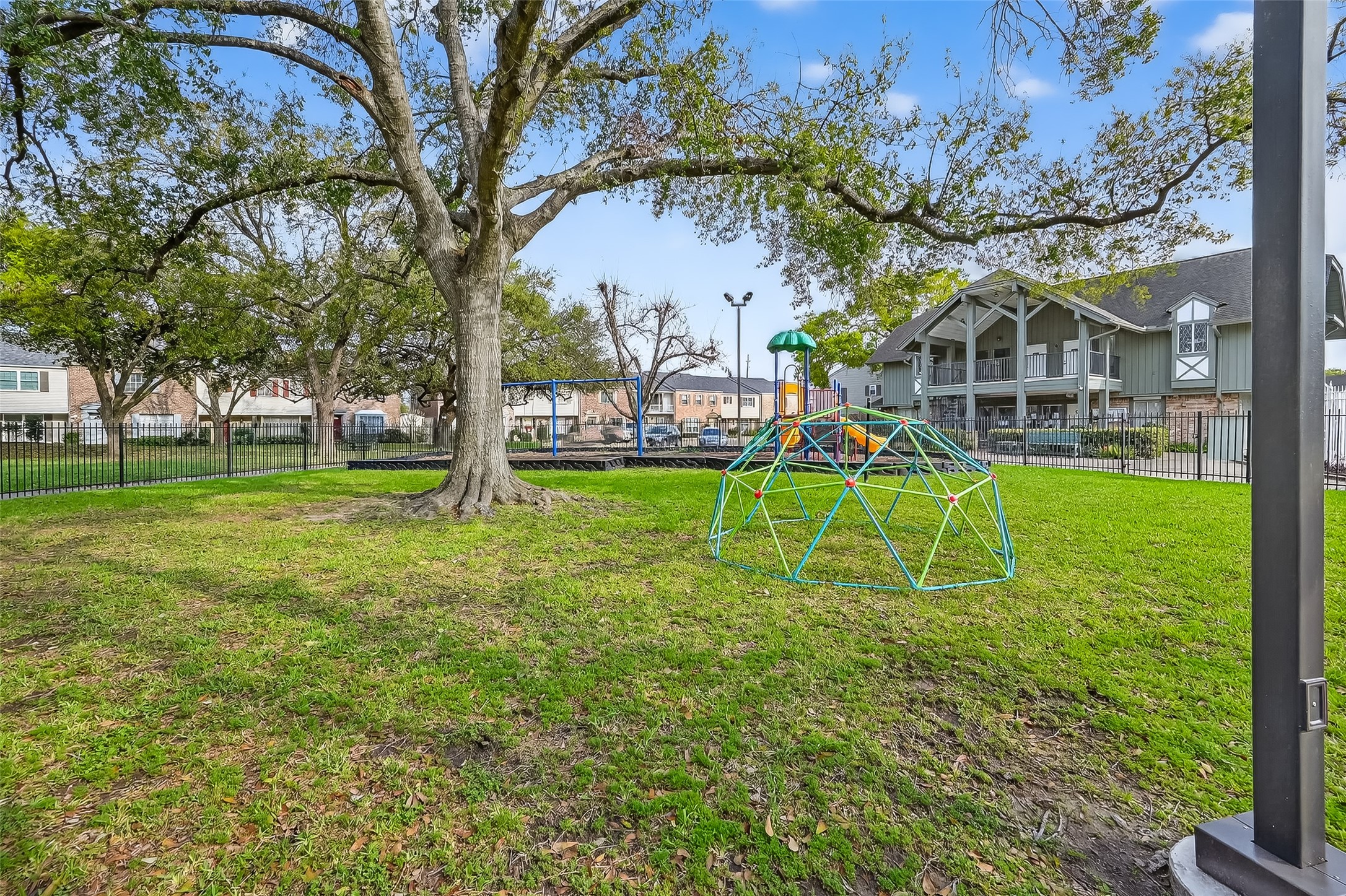 Community playground and newly added garden area offering outdoor amenities in the Briar Grove Townhome community near Uptown Houston.