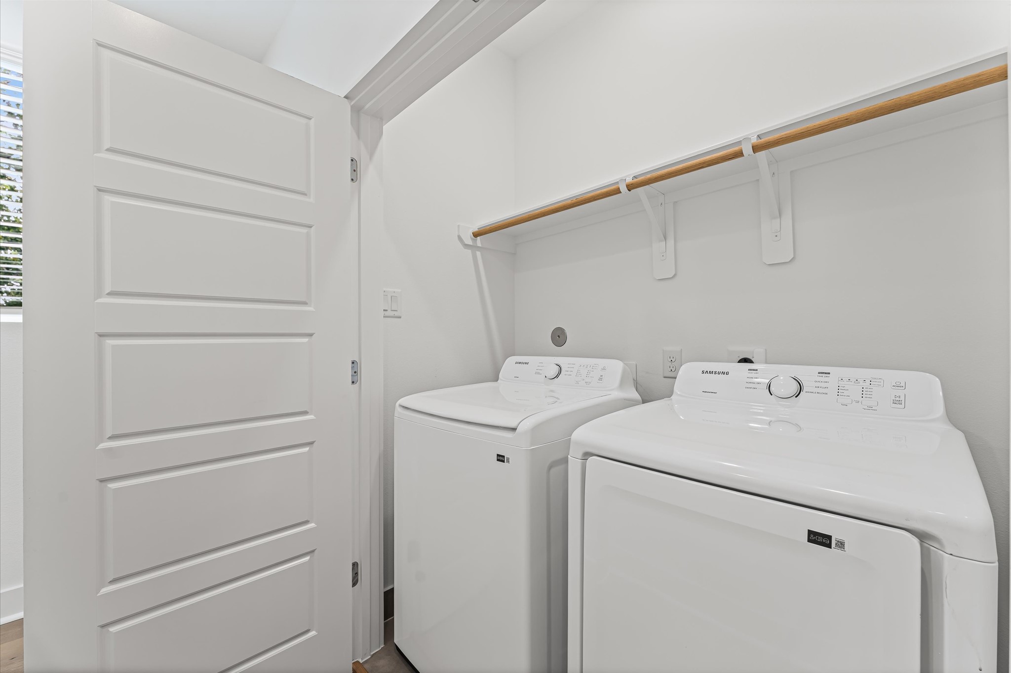 Conveniently located on the second floor, this well-appointed laundry room offers easy access from nearby bedroomsstreamlining daily routines and eliminating the need to carry laundry up and down stairs.