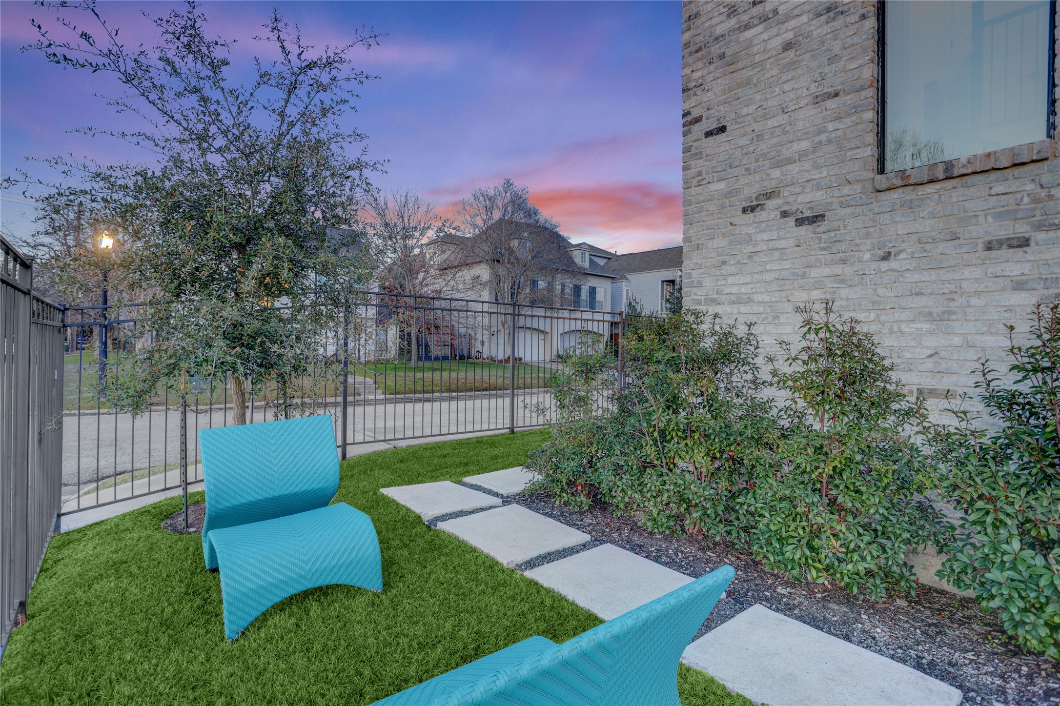 Secure and private yard with elegant gating.