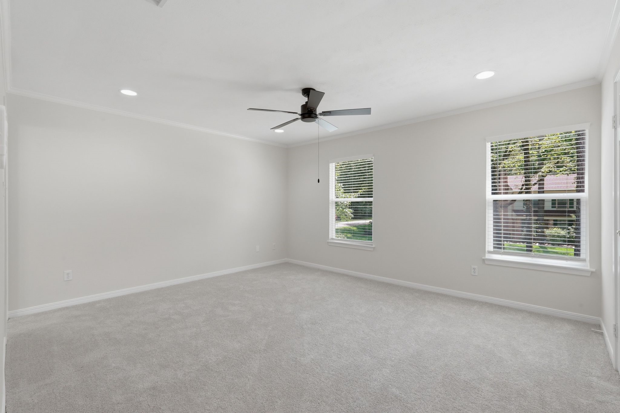At the end of the hallway to the right is your SECOND primary bedroom with plenty of space for large furniture and a walk in closet.