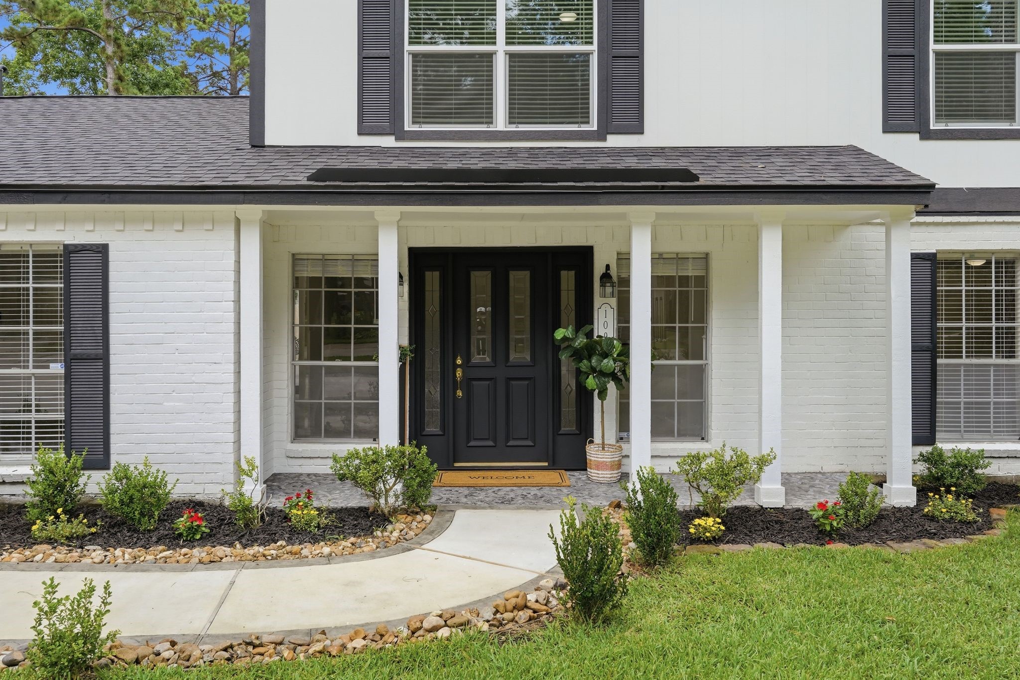 Here is entrance number two, the main entrance to the home with another large front porch, perfect for decorating for every season. Here is entrance number two, the main entrance to the home with another large front porch, perfect for decorating for every season.