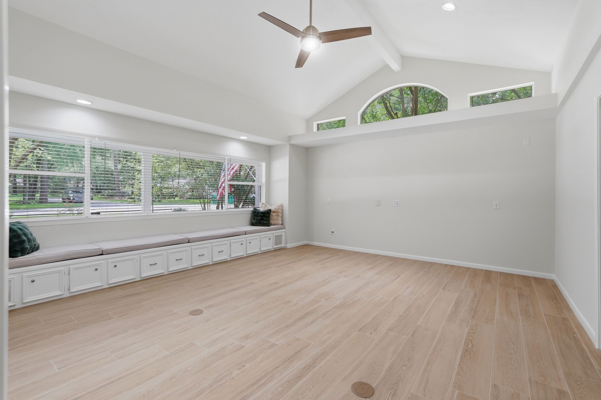 Did someone request the primary bedroom of your dreams? Your wish is our command! This primary bedroom has vaulted ceilings and a bench that runs along the windows for a true wow factor.