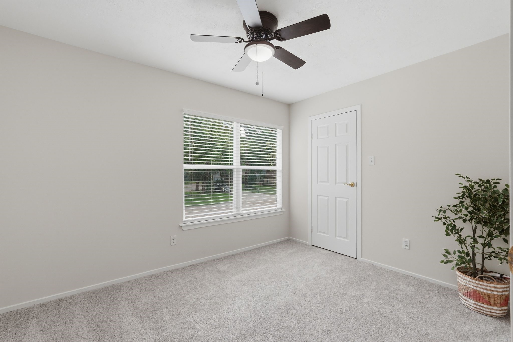 At the top of the stairs, there is a bedroom on the right. This room has a nice walk in close.