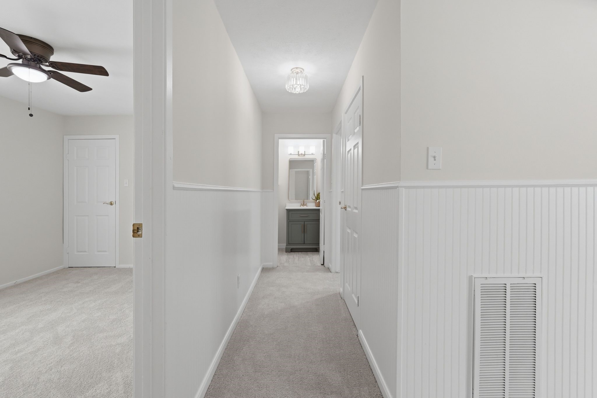 Now we're going to go back to your front door and go up the stairs to check out the second floor.