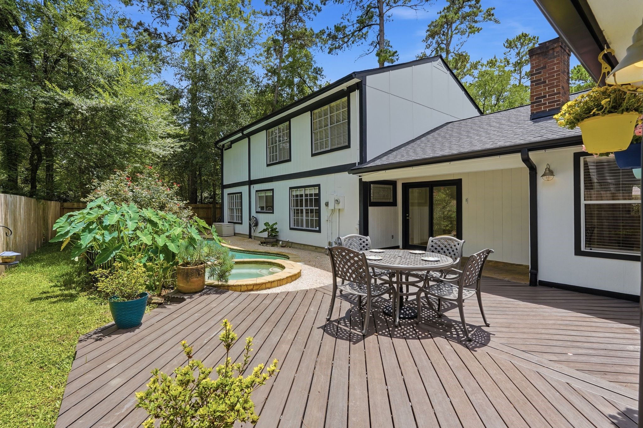 Now, the moment you've been waiting for, THE BACKYARD! This extended patio and pool makes this space a whole vibe.